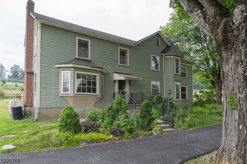 131 Karrville Road Port Murray, NJ 07865 - Photo 21 of 23 a front view of a house with garden
