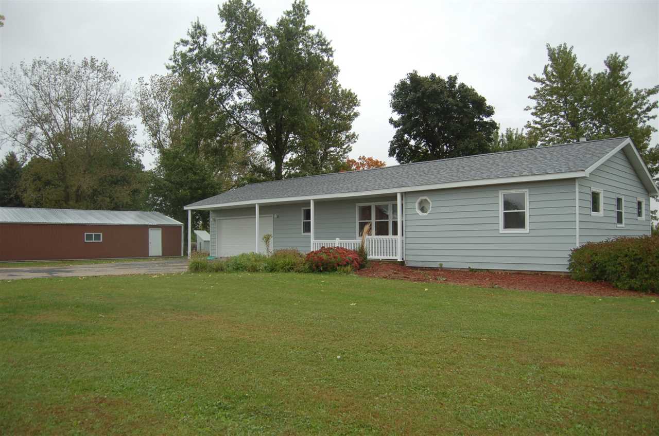 7860 Gurler Road DeKalb, IL 60115 - Photo 1 of 23 a view of a house with a yard