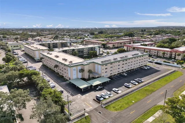 an aerial view of a house with a garden