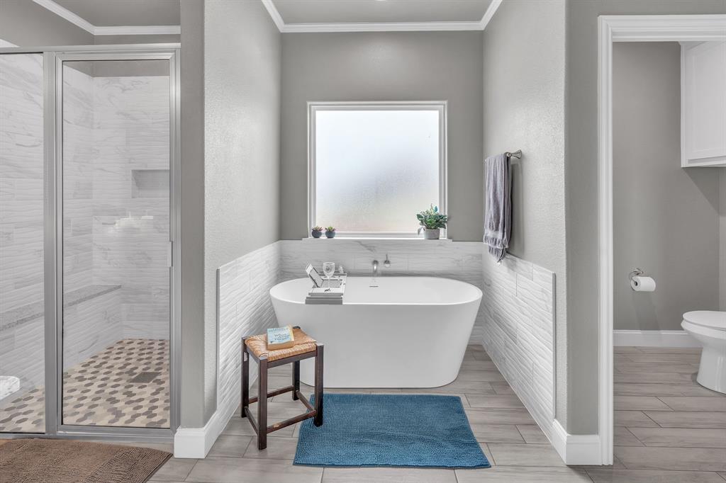 7609 Carter Ranch Road Azle, TX 76020 - Photo 23 of 38 Garden tub and separate shower