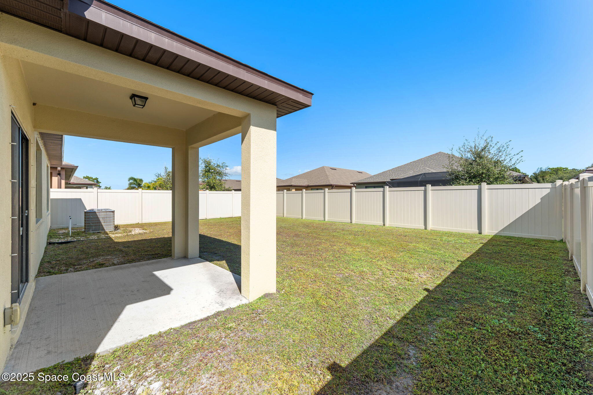 4667 Magenta Isles Drive Melbourne, FL 32904 - Photo 17 of 29 a view of backyard of the house
