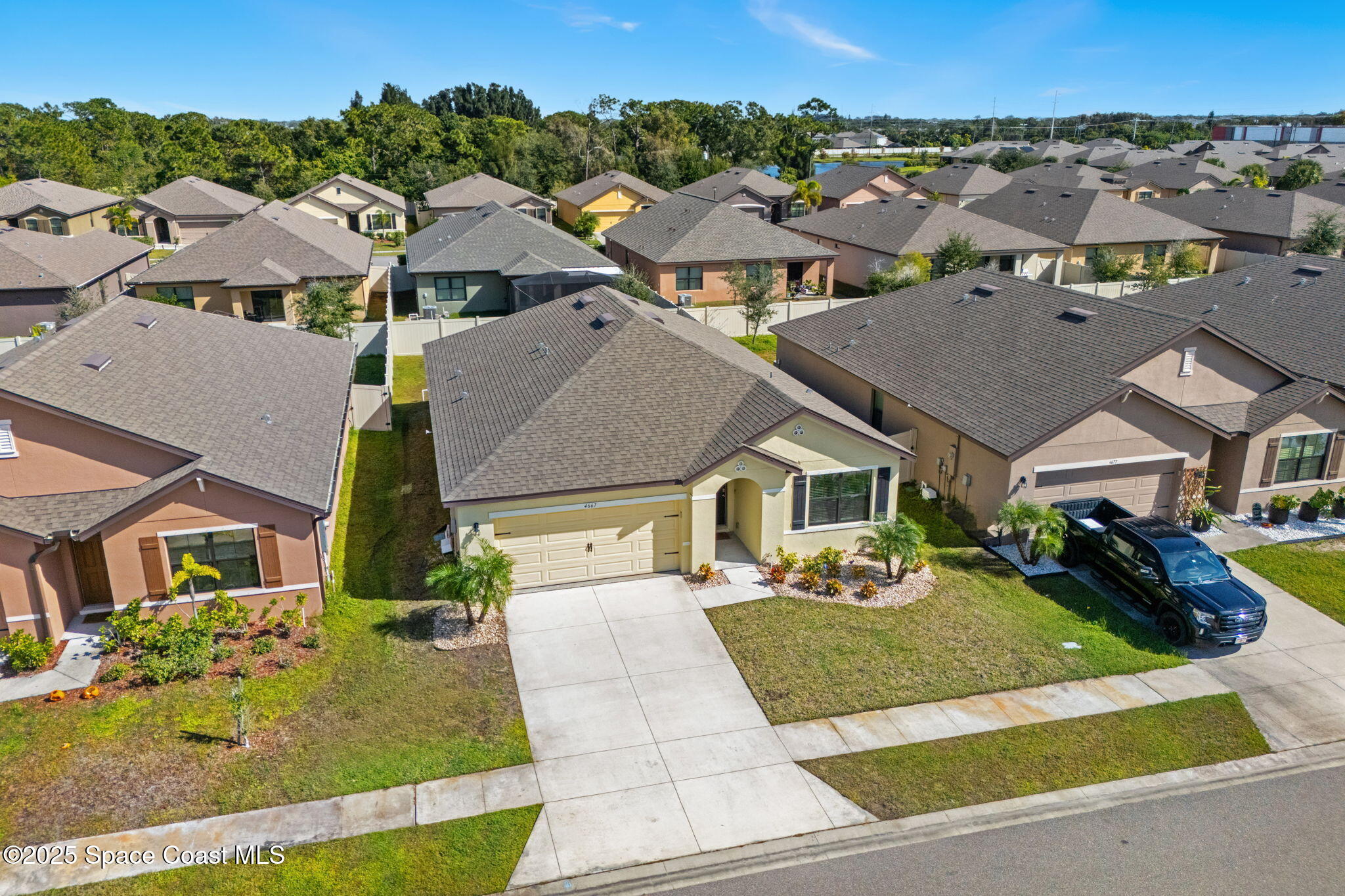 4667 Magenta Isles Drive Melbourne, FL 32904 - Photo 21 of 29 an aerial view of a house with a yard