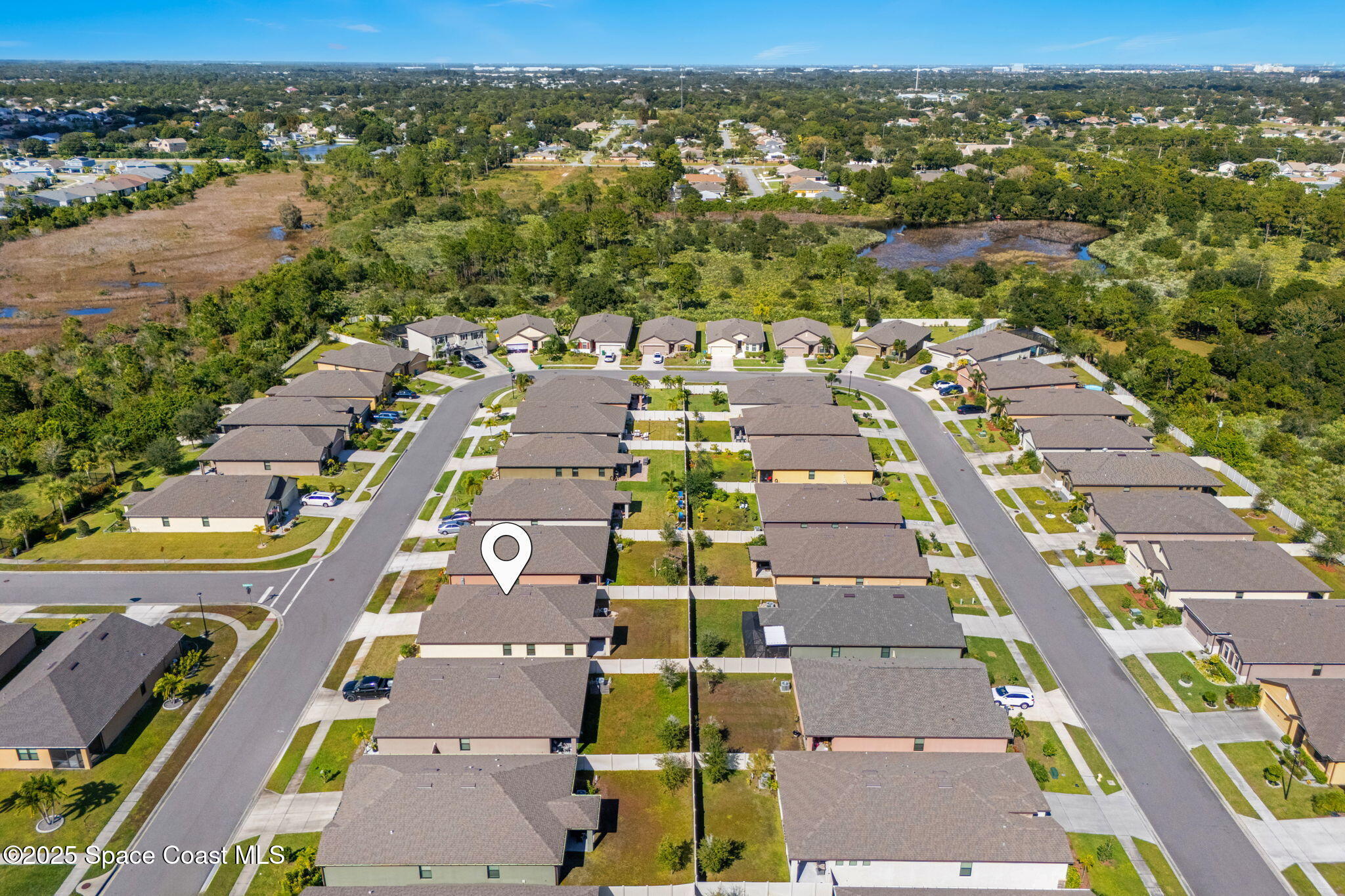 4667 Magenta Isles Drive Melbourne, FL 32904 - Photo 26 of 29 an aerial view of residential building