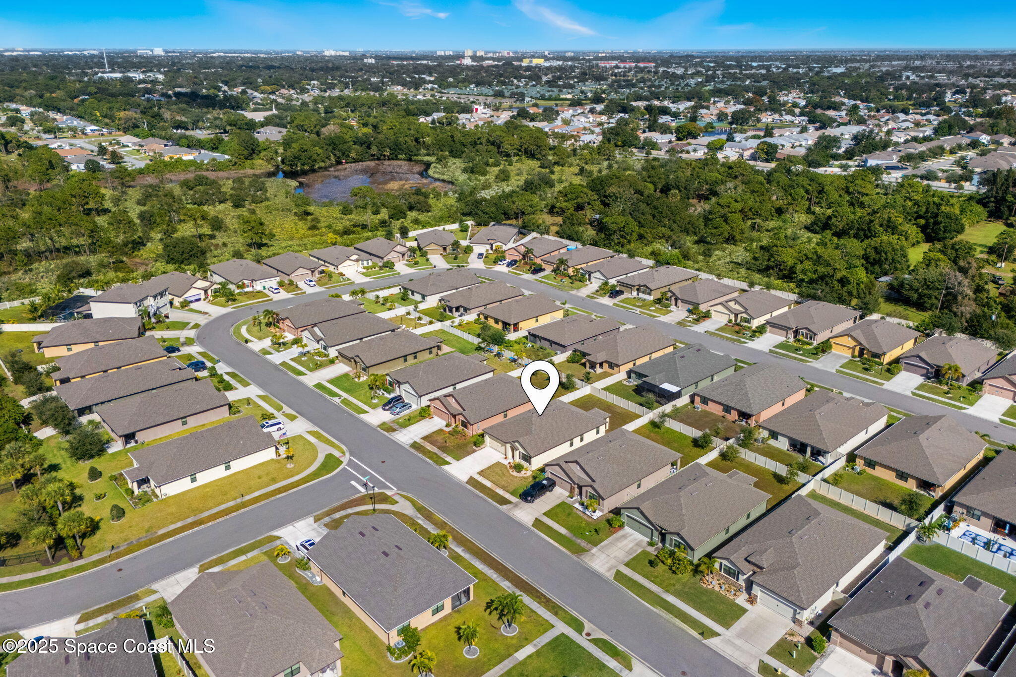 4667 Magenta Isles Drive Melbourne, FL 32904 - Photo 27 of 29 an aerial view of residential houses with outdoor space