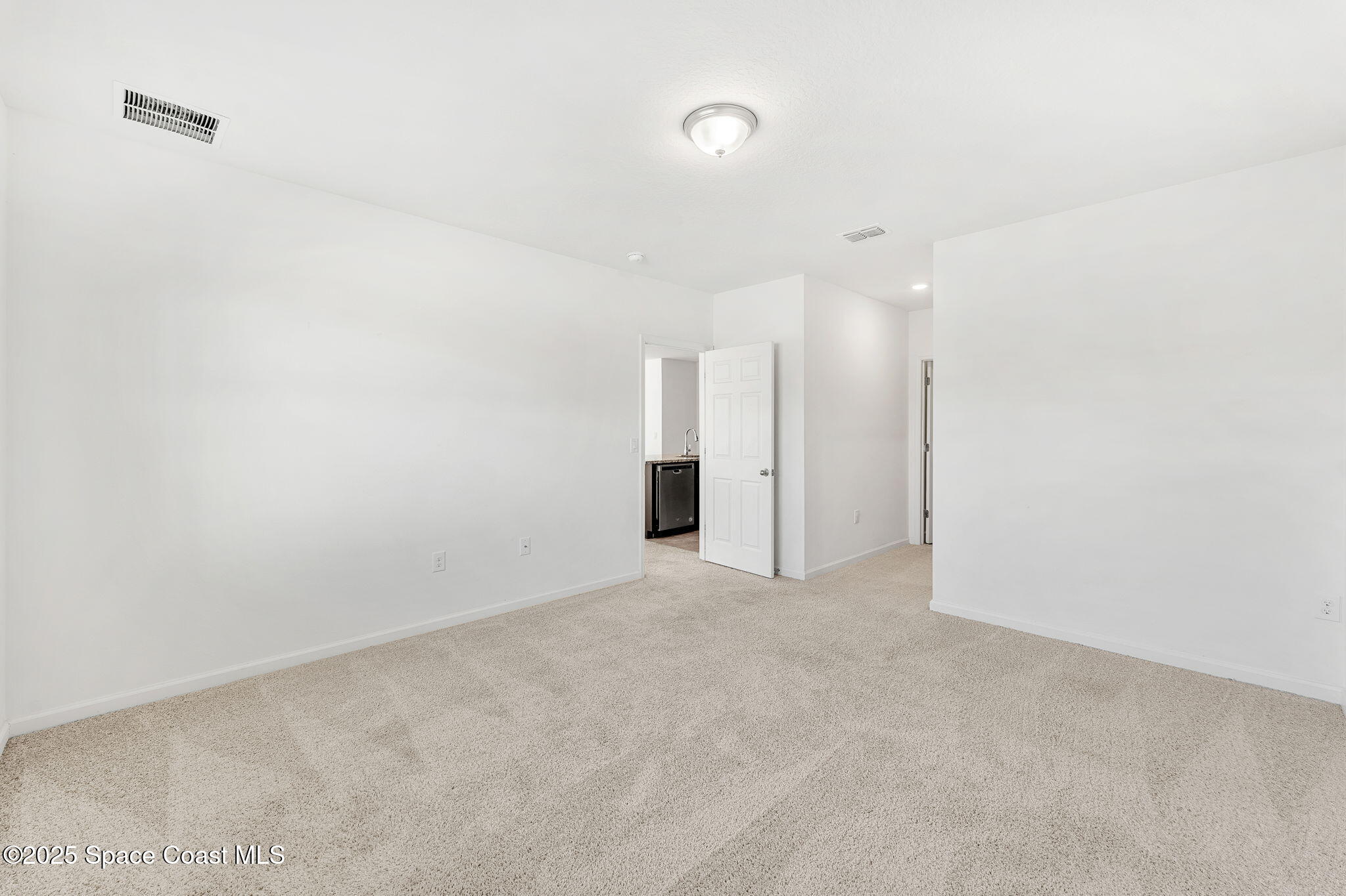 4667 Magenta Isles Drive Melbourne, FL 32904 - Photo 10 of 29 a view of an empty room