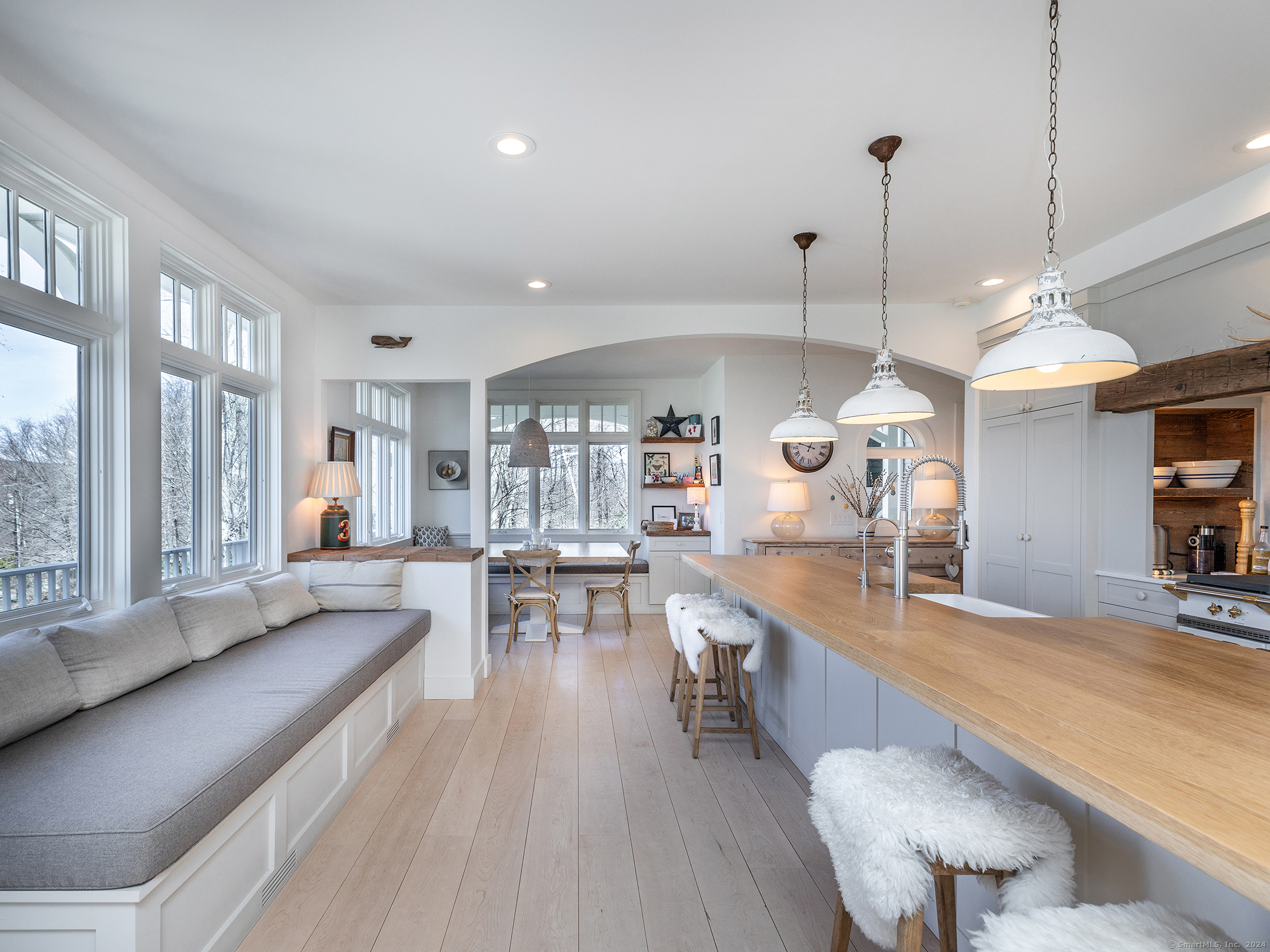96 Kinney Hill Road New Preston Marble Dale, CT 06777 - Photo 11 of 36 a large kitchen with a large window and stainless steel appliances