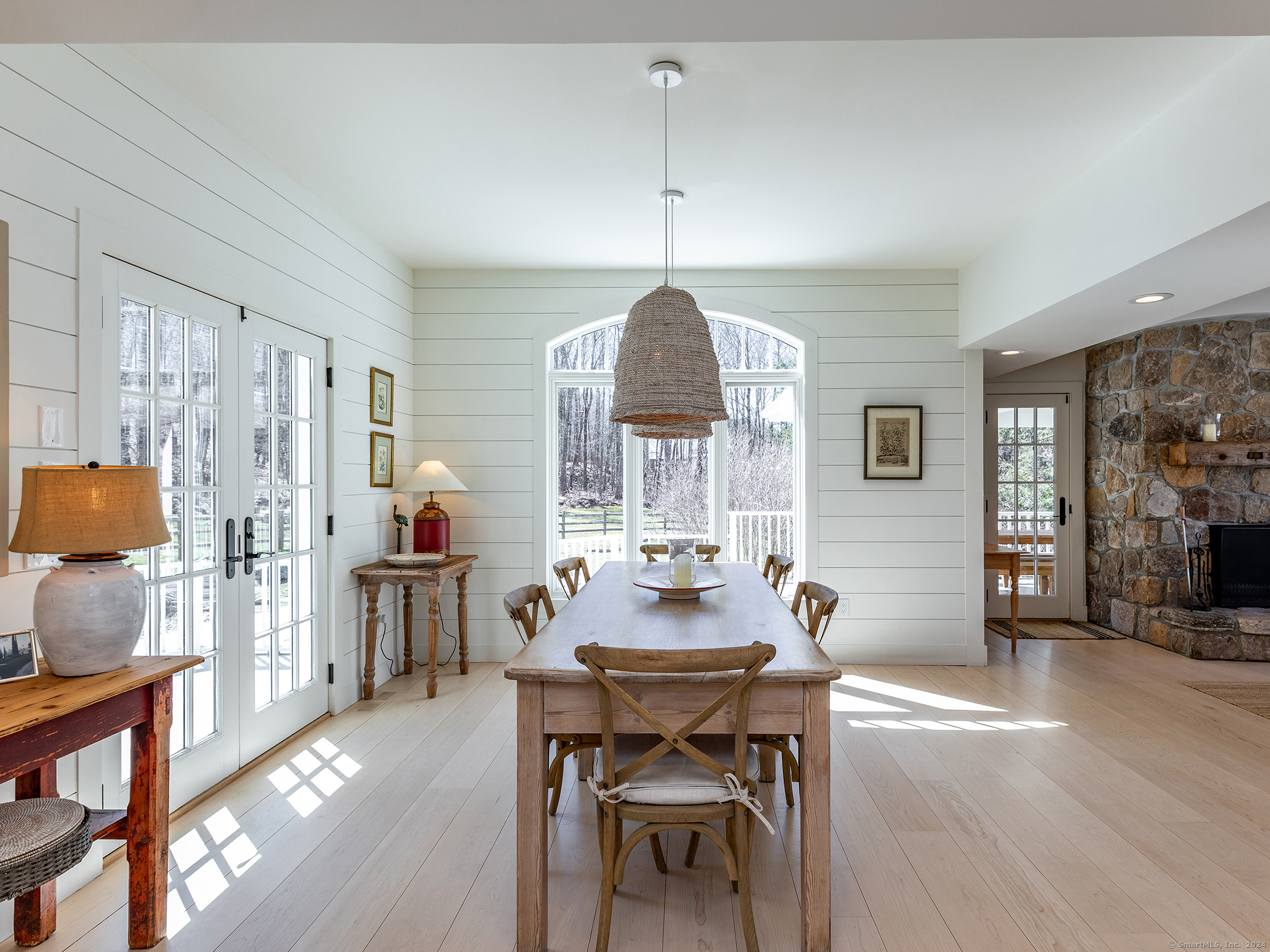 96 Kinney Hill Road New Preston Marble Dale, CT 06777 - Photo 13 of 36 a view of a dining room with furniture window and wooden floor