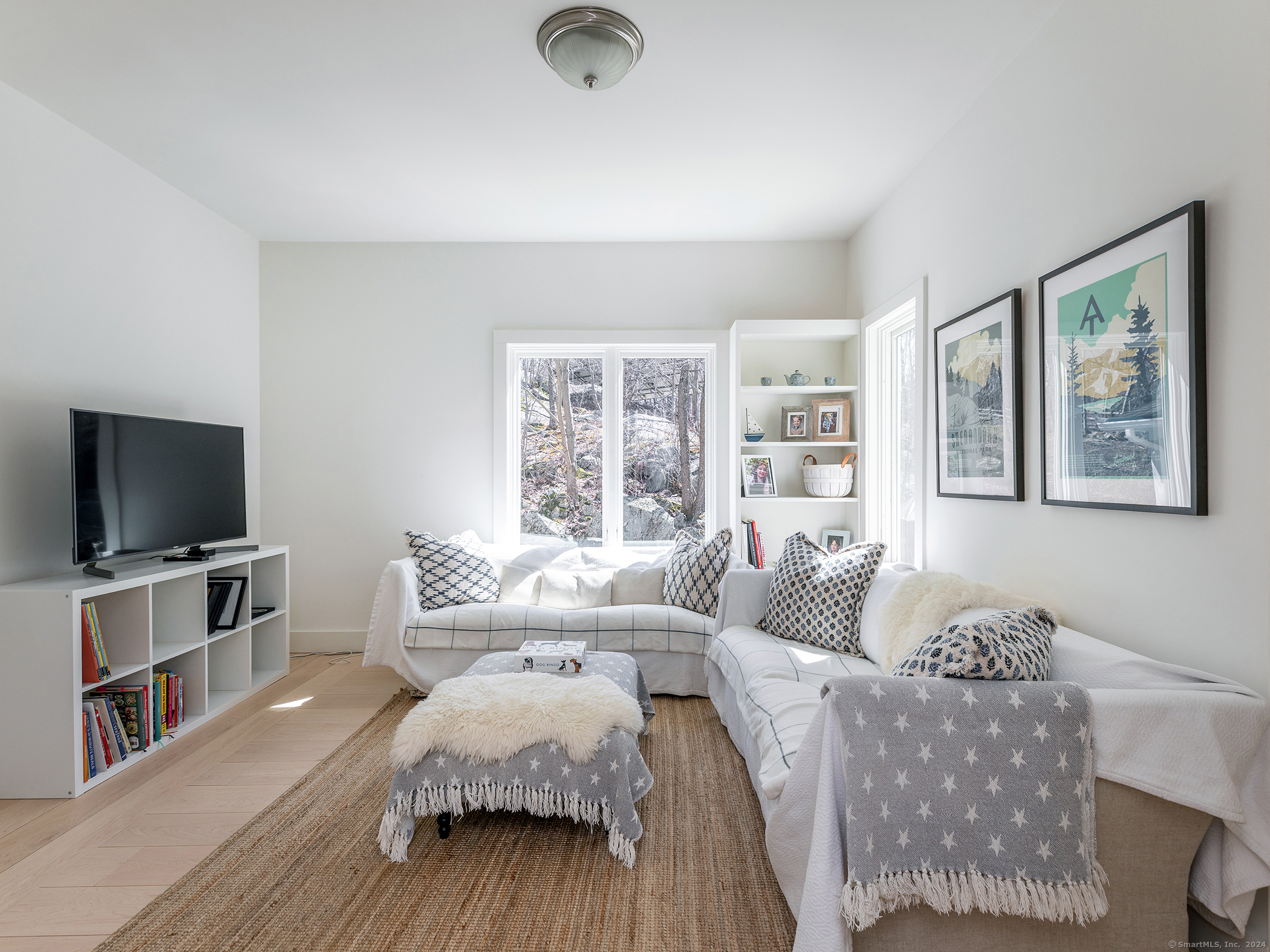 96 Kinney Hill Road New Preston Marble Dale, CT 06777 - Photo 15 of 36 a living room with furniture and a flat screen tv