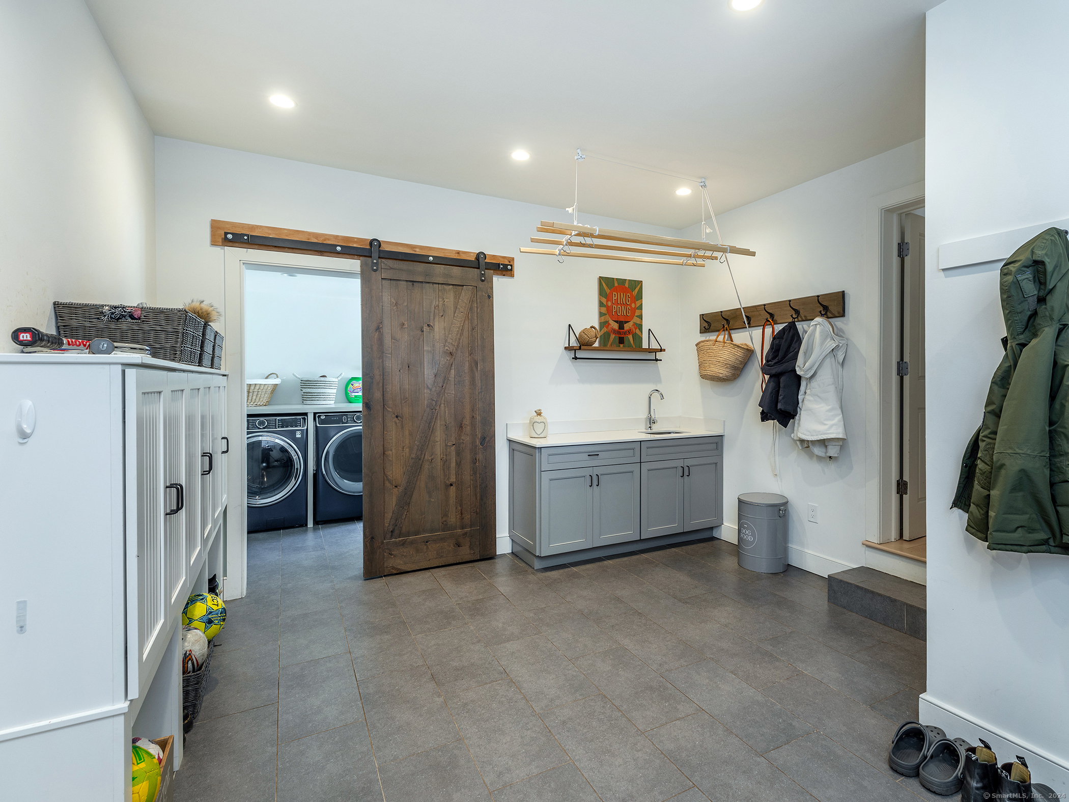 96 Kinney Hill Road New Preston Marble Dale, CT 06777 - Photo 25 of 36 a storage room with washer and dryer