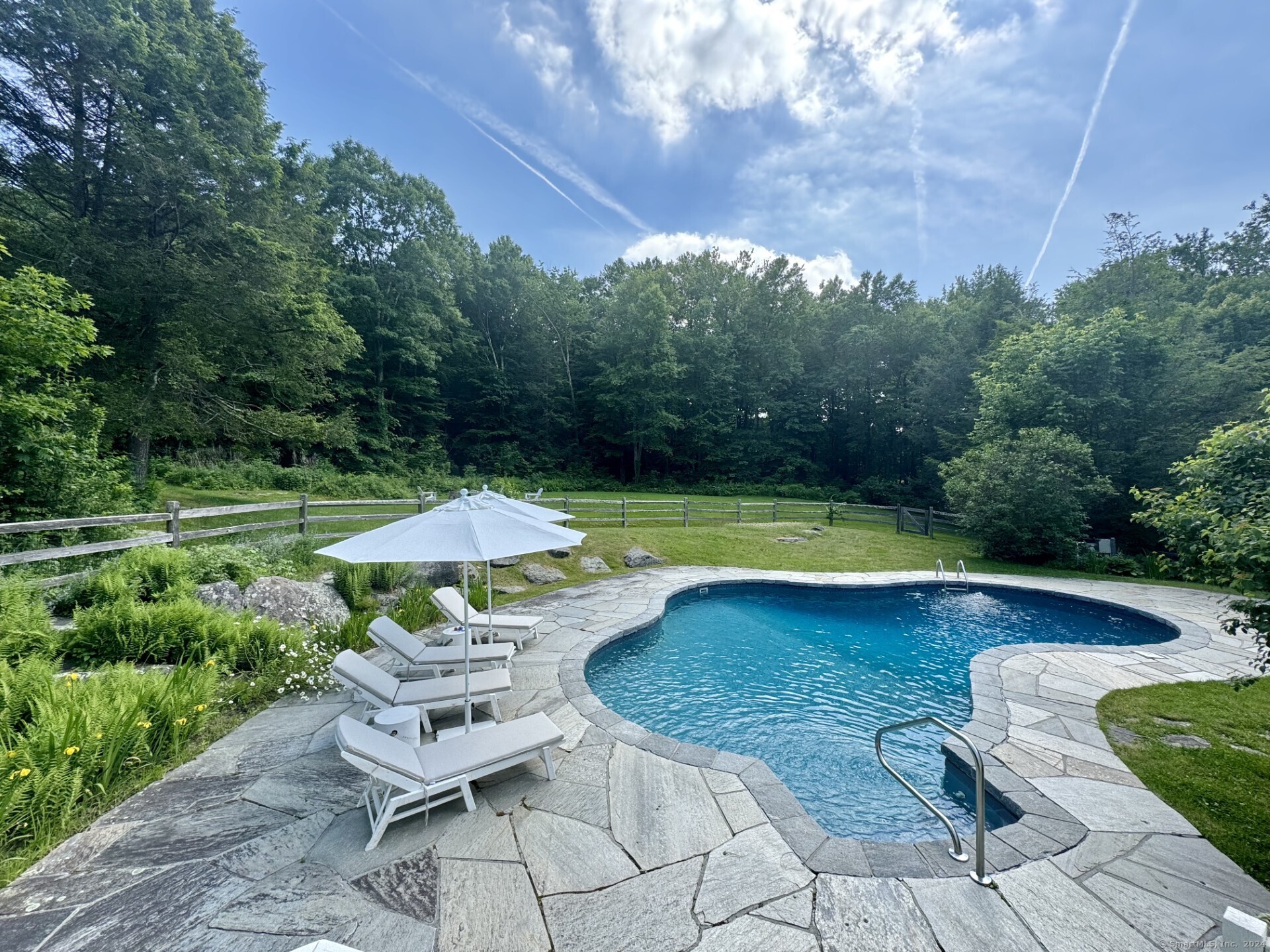 96 Kinney Hill Road New Preston Marble Dale, CT 06777 - Photo 27 of 36 a view of a swimming pool with a yard