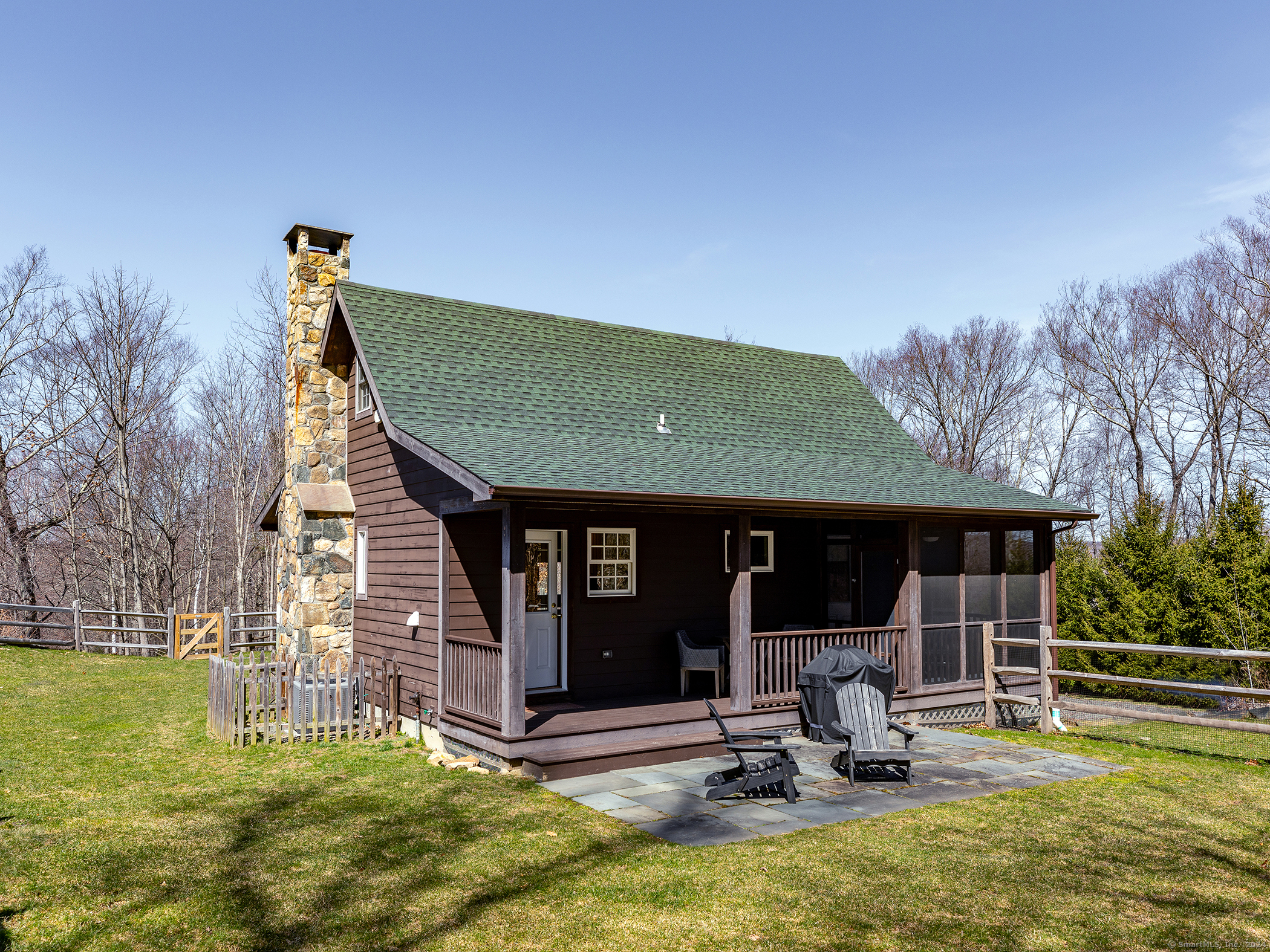 96 Kinney Hill Road New Preston Marble Dale, CT 06777 - Photo 30 of 36 a view of a house with backyard porch and sitting area