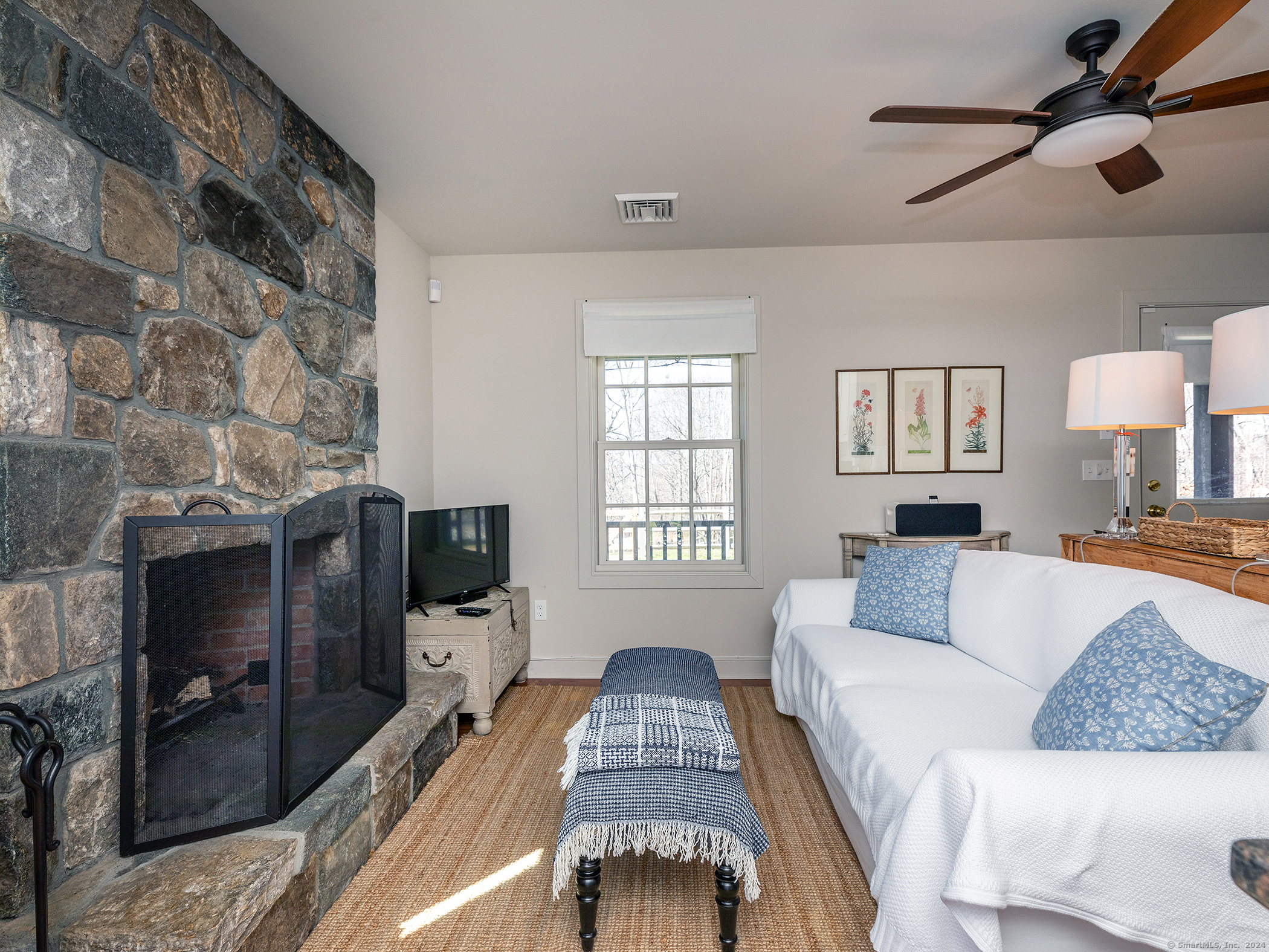 96 Kinney Hill Road New Preston Marble Dale, CT 06777 - Photo 33 of 36 a living room with furniture and a flat screen tv