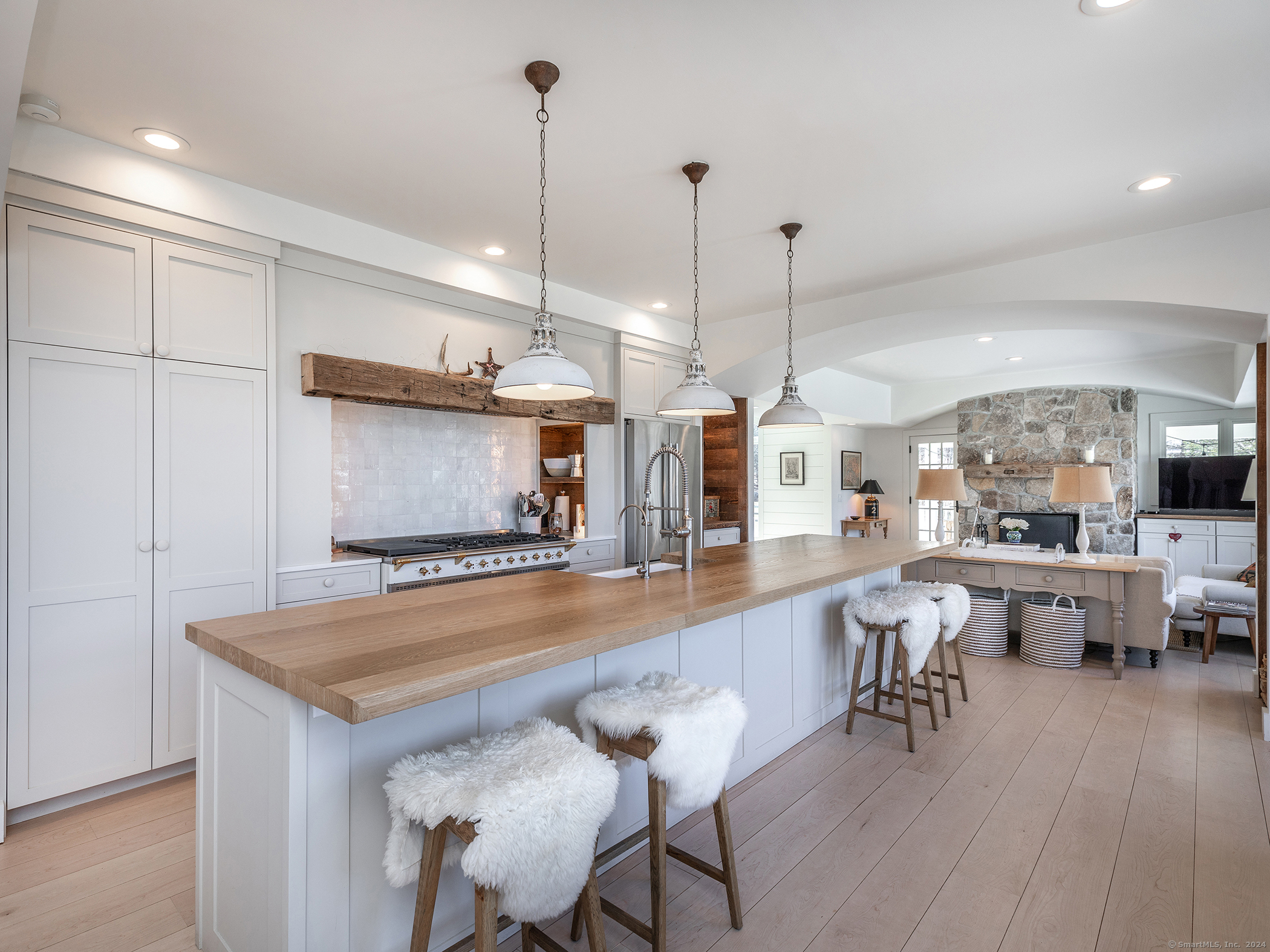 96 Kinney Hill Road New Preston Marble Dale, CT 06777 - Photo 4 of 36 a view of a dining room and livingroom with furniture wooden floor a chandelier