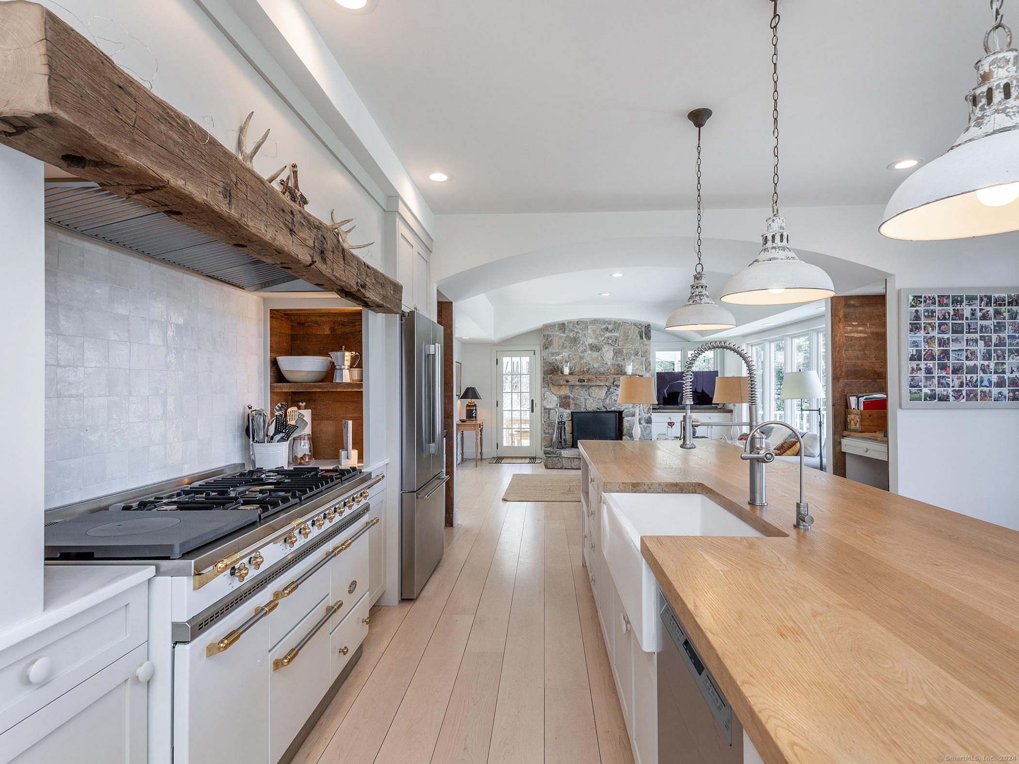 96 Kinney Hill Road New Preston Marble Dale, CT 06777 - Photo 5 of 36 a kitchen with stainless steel appliances granite countertop a stove and cabinets