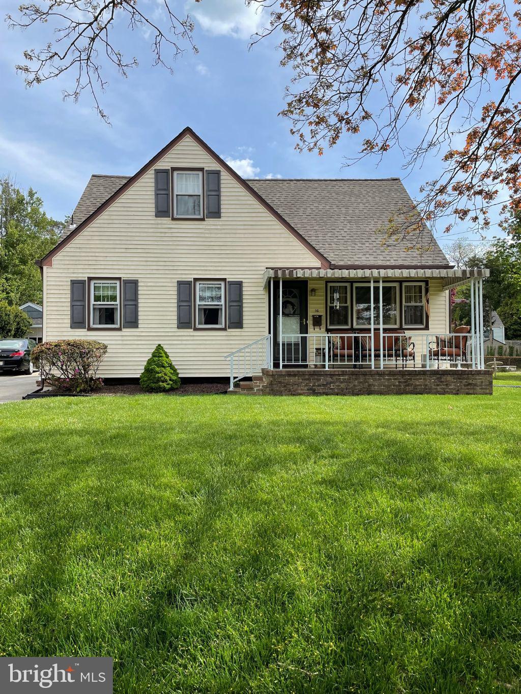 16 Ridgley Street Mount Holly, NJ 08060 - Photo 1 of 29 a front view of a house with garden