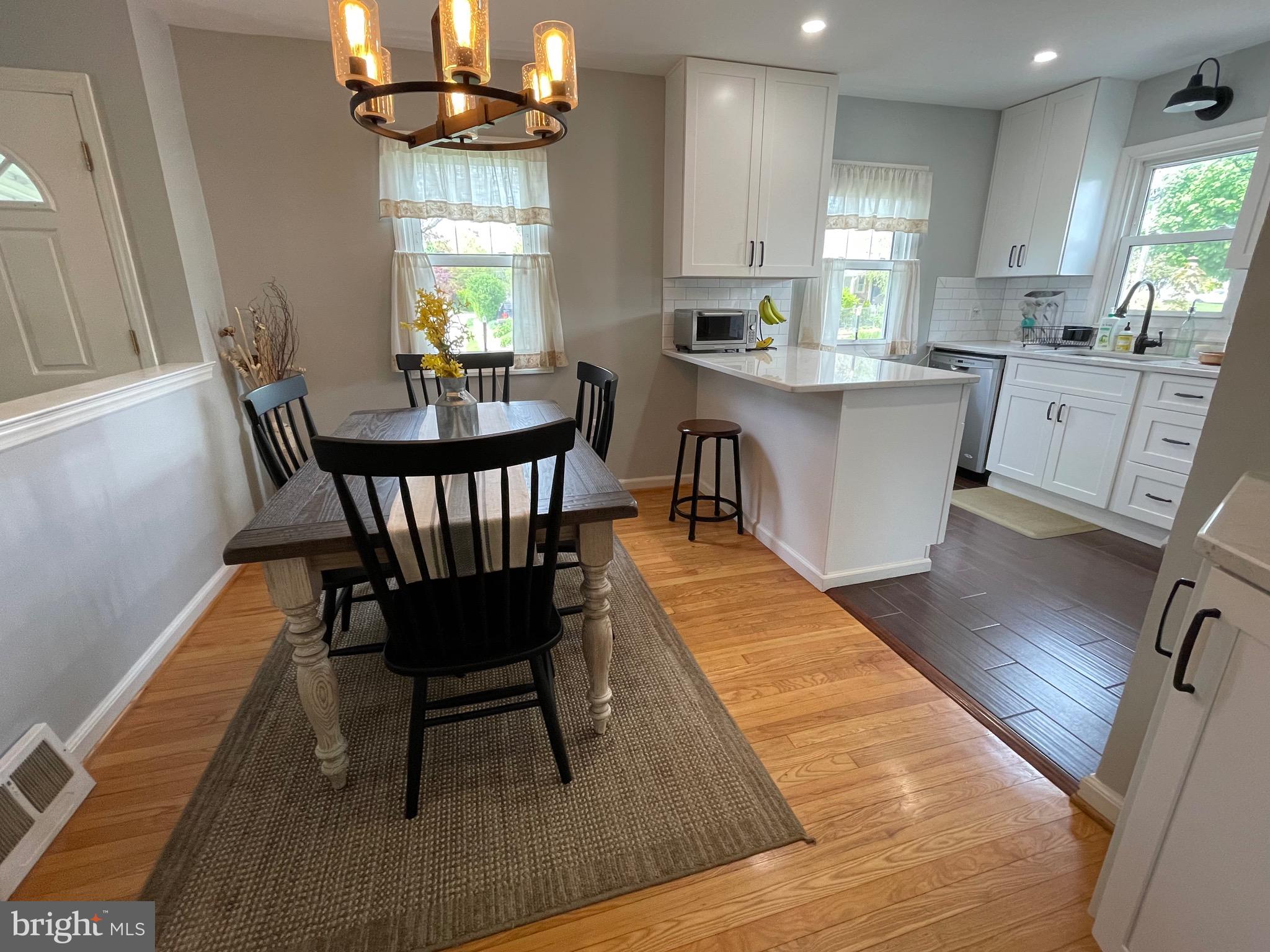 16 Ridgley Street Mount Holly, NJ 08060 - Photo 16 of 29 a view of a dining room with furniture window and wooden floor