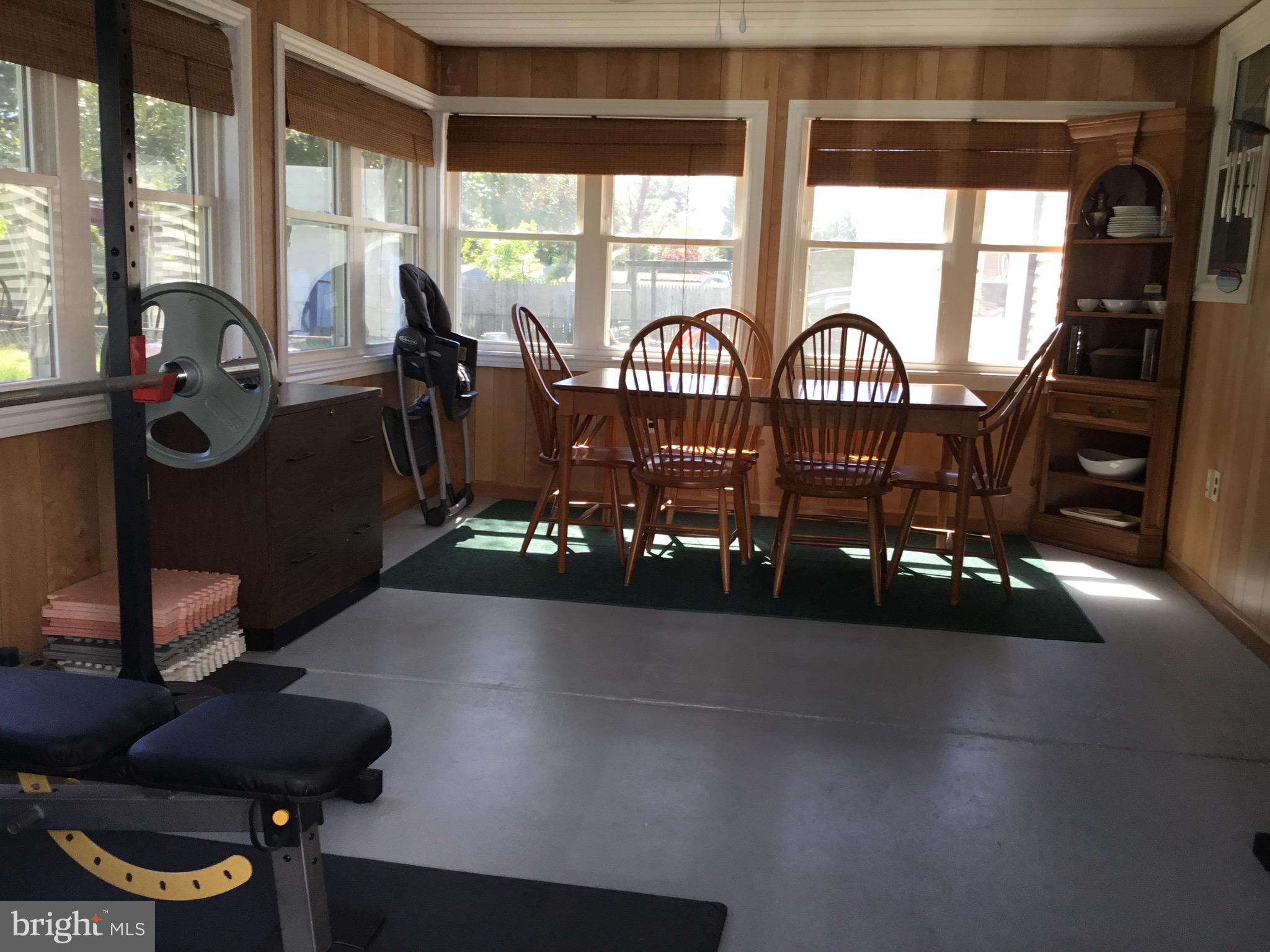 16 Ridgley Street Mount Holly, NJ 08060 - Photo 20 of 29 a view of a porch with furniture and floor to ceiling window