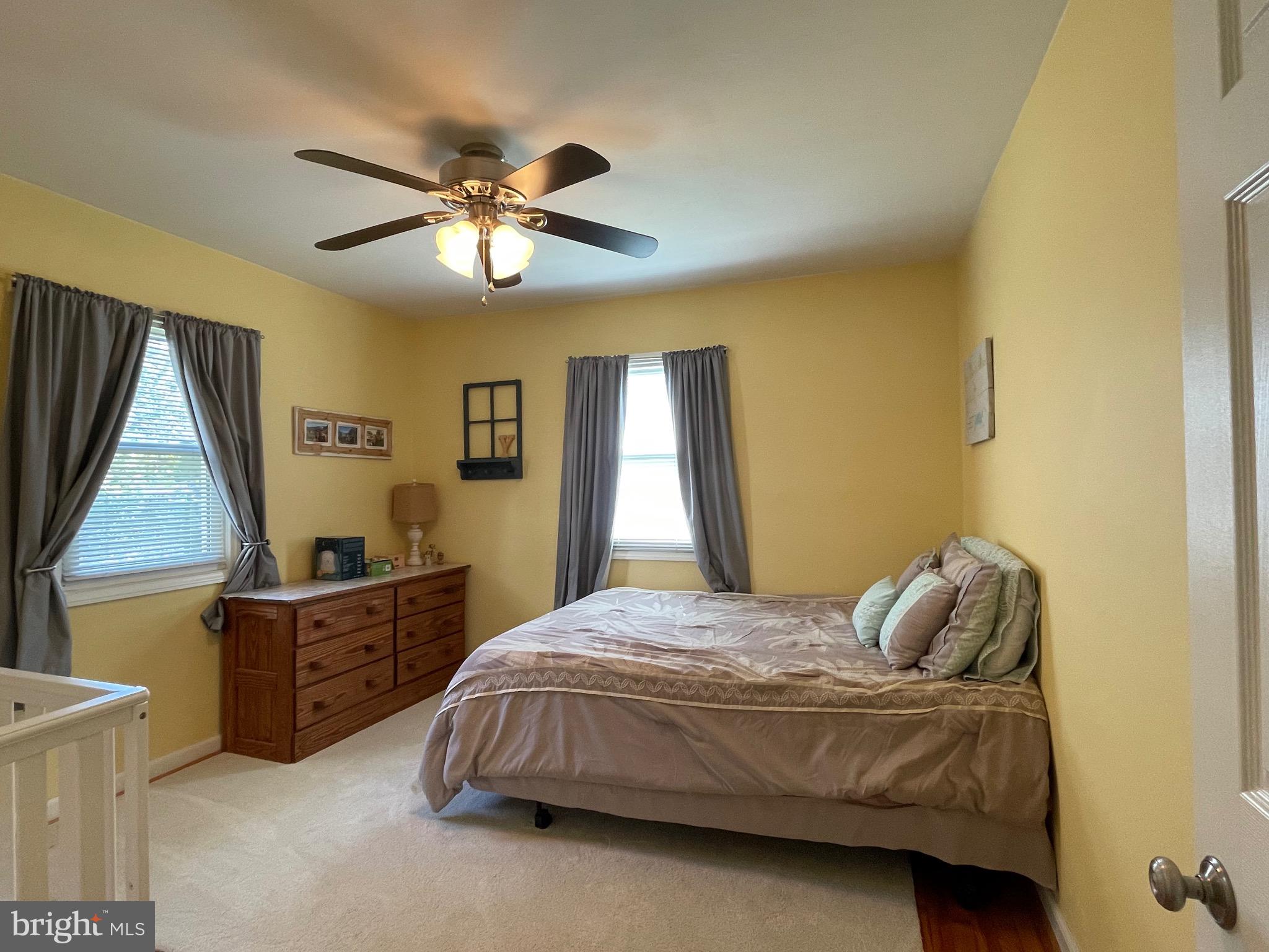 16 Ridgley Street Mount Holly, NJ 08060 - Photo 25 of 29 a bedroom with a bed and window