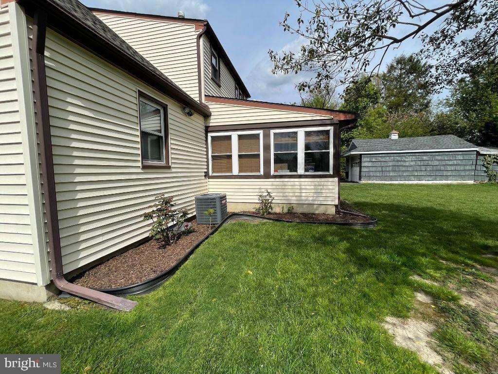 16 Ridgley Street Mount Holly, NJ 08060 - Photo 4 of 29 a front view of a house with a yard