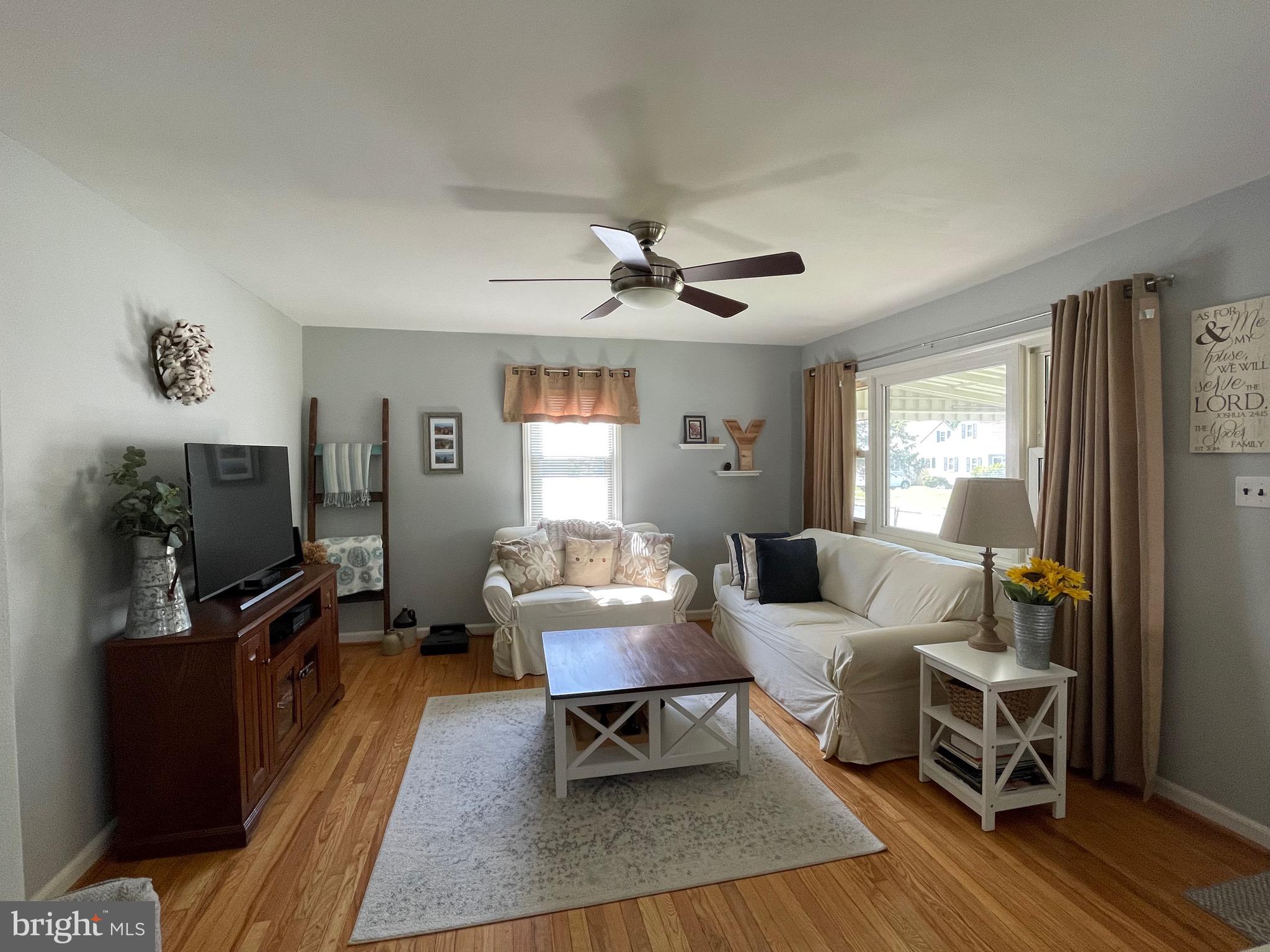16 Ridgley Street Mount Holly, NJ 08060 - Photo 9 of 29 a living room with furniture flat screen tv and window