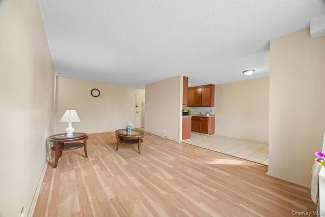 a view of a kitchen with a table and chairs