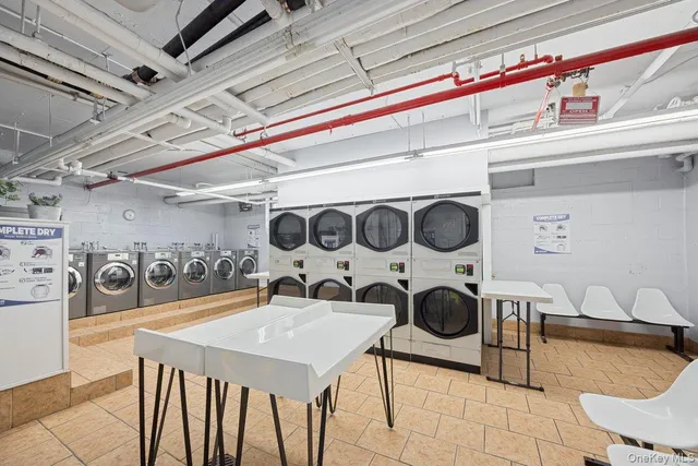 a view of entryway with workspace and a window