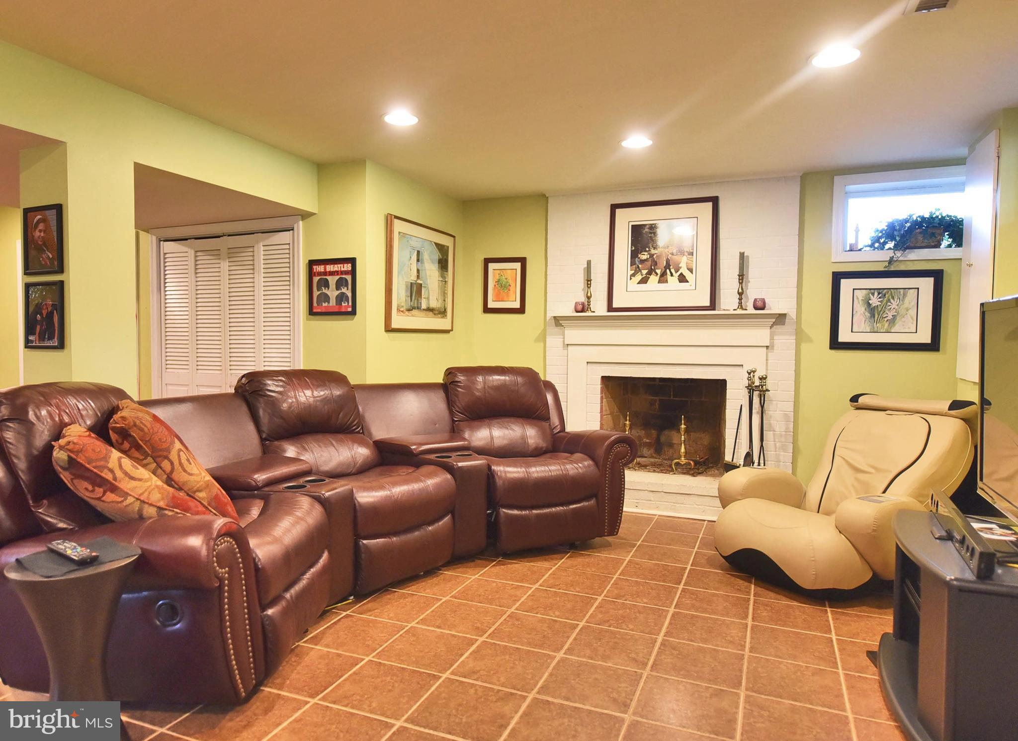 806 Stoneleigh Road Baltimore, MD 21212 - Photo 24 of 29 Finished Basement with WB Fireplace and Full Bath