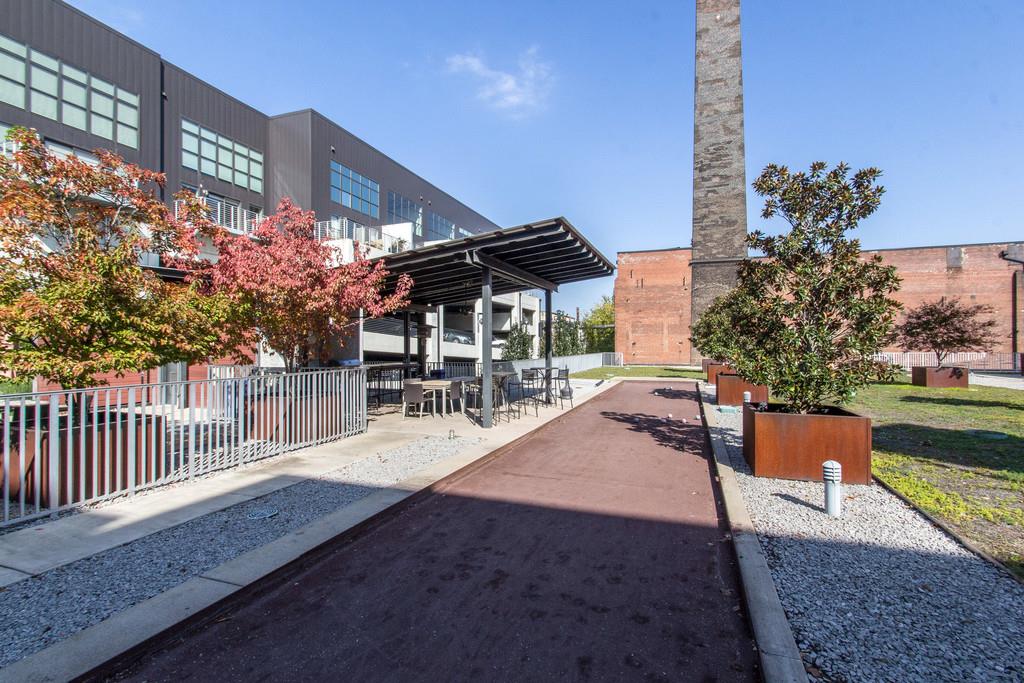 1350 Rosa L Parks Boulevard, Unit 340 Nashville, TN 37208 - Photo 16 of 18 a view of a chairs and tables in the patio