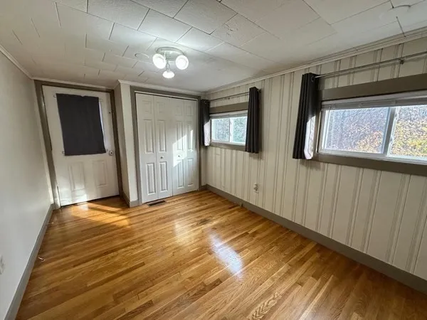 a view of an empty room and window