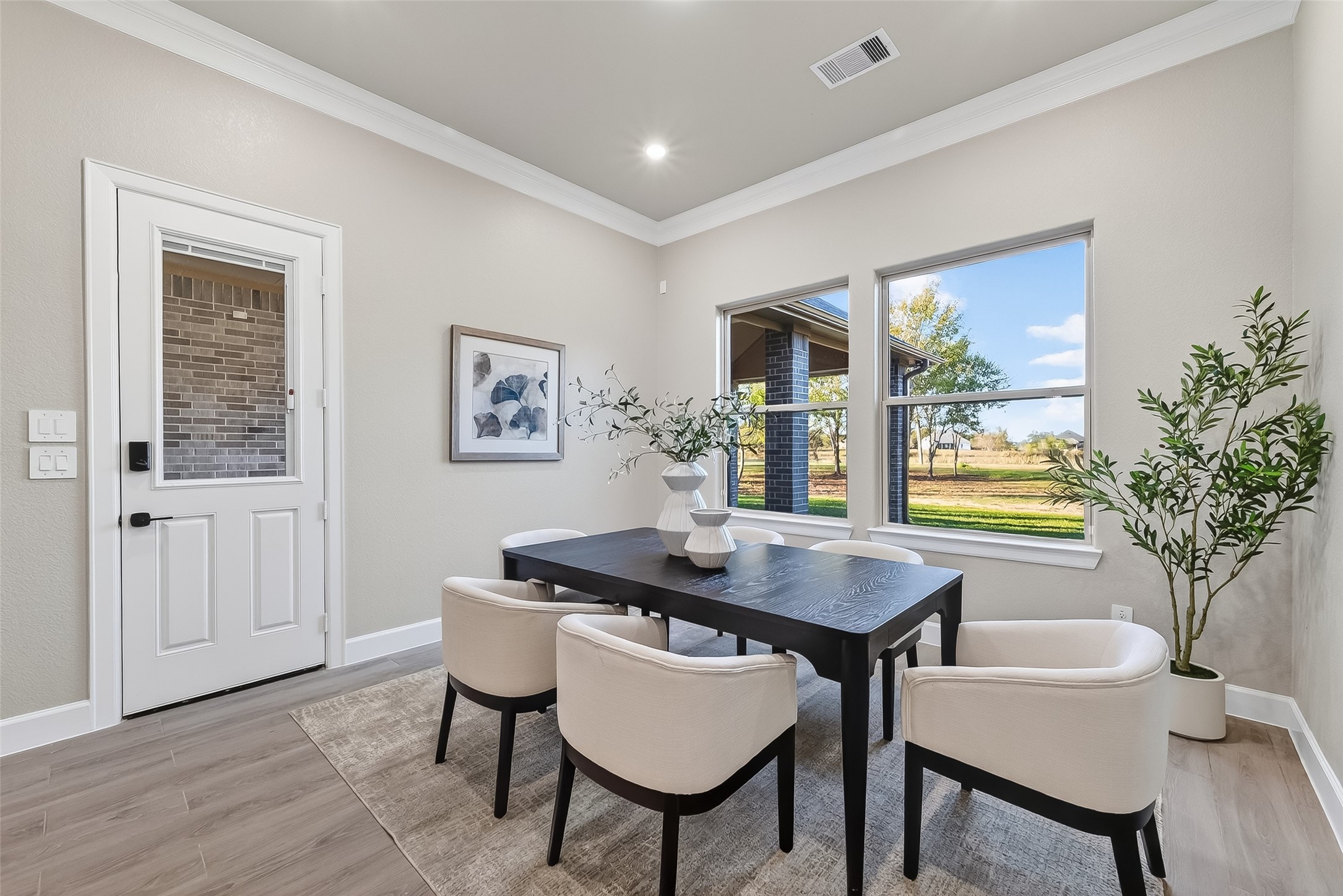 350 Lakeland Circle Rosharon, TX 77583 - Photo 12 of 49 a dining room with furniture and window