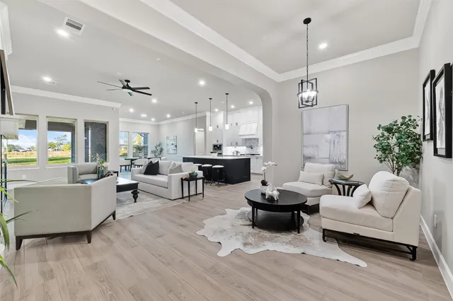 a bathroom with a sink a toilet and bathtub