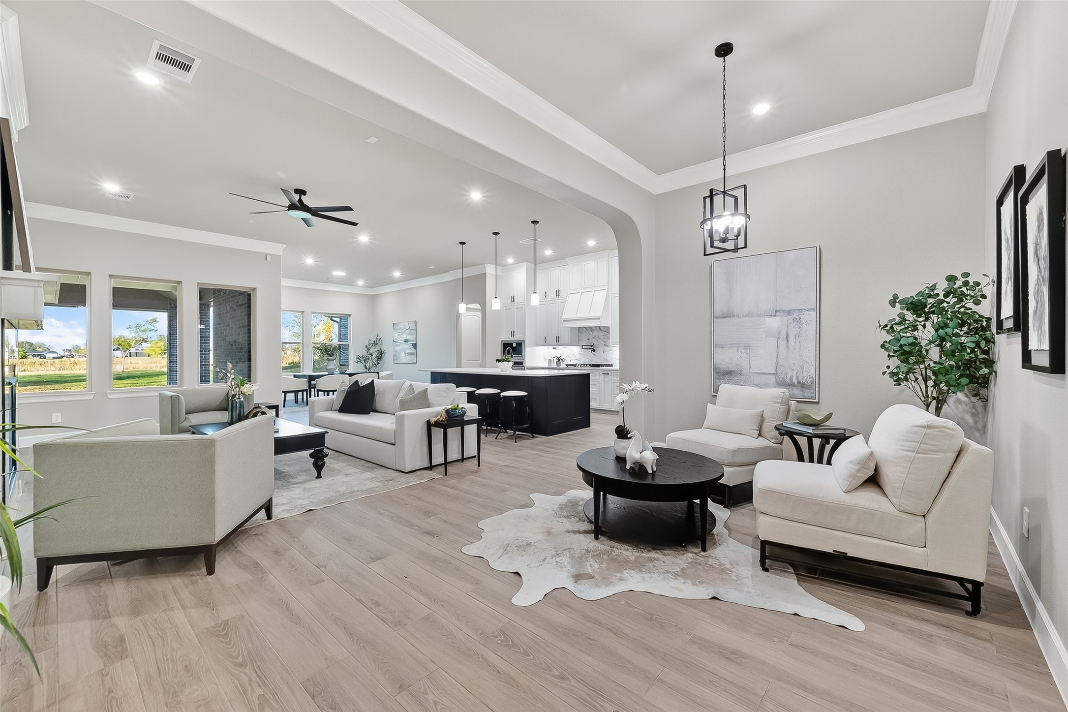 350 Lakeland Circle Rosharon, TX 77583 - Photo 20 of 49 a living room with furniture and a chandelier