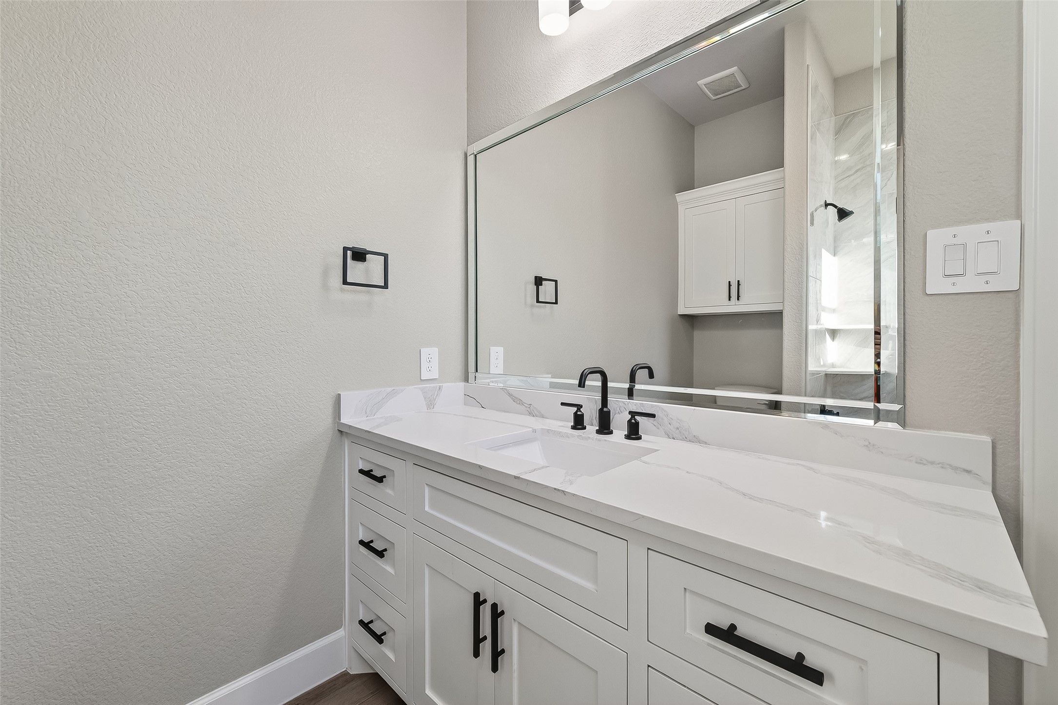 350 Lakeland Circle Rosharon, TX 77583 - Photo 34 of 49 a bathroom with a sink and a mirror