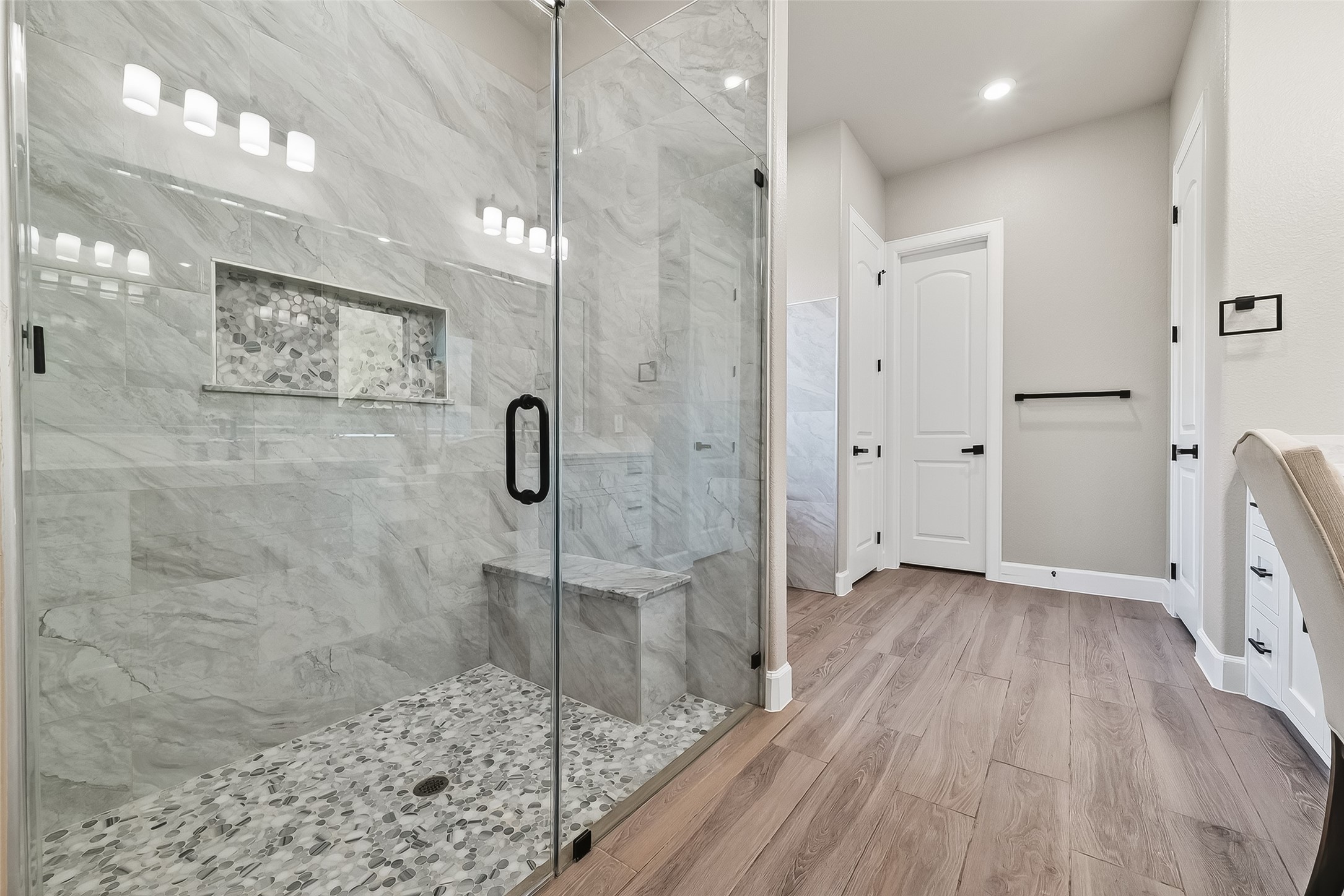 350 Lakeland Circle Rosharon, TX 77583 - Photo 42 of 49 a bathroom with a glass shower door and a glass door