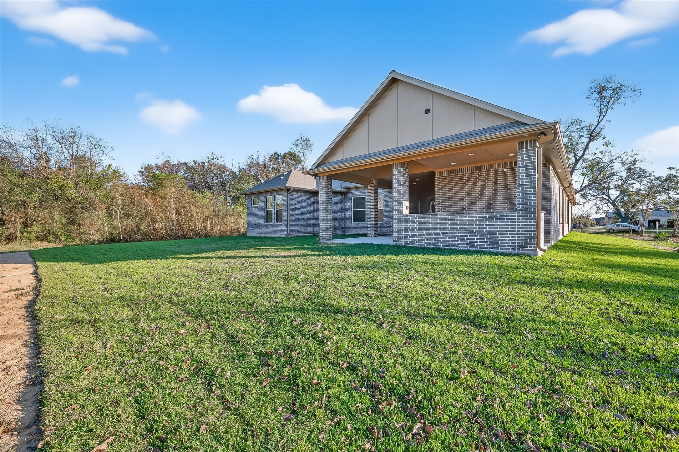 350 Lakeland Circle Rosharon, TX 77583 - Photo 5 of 49 a front view of house with yard and green space