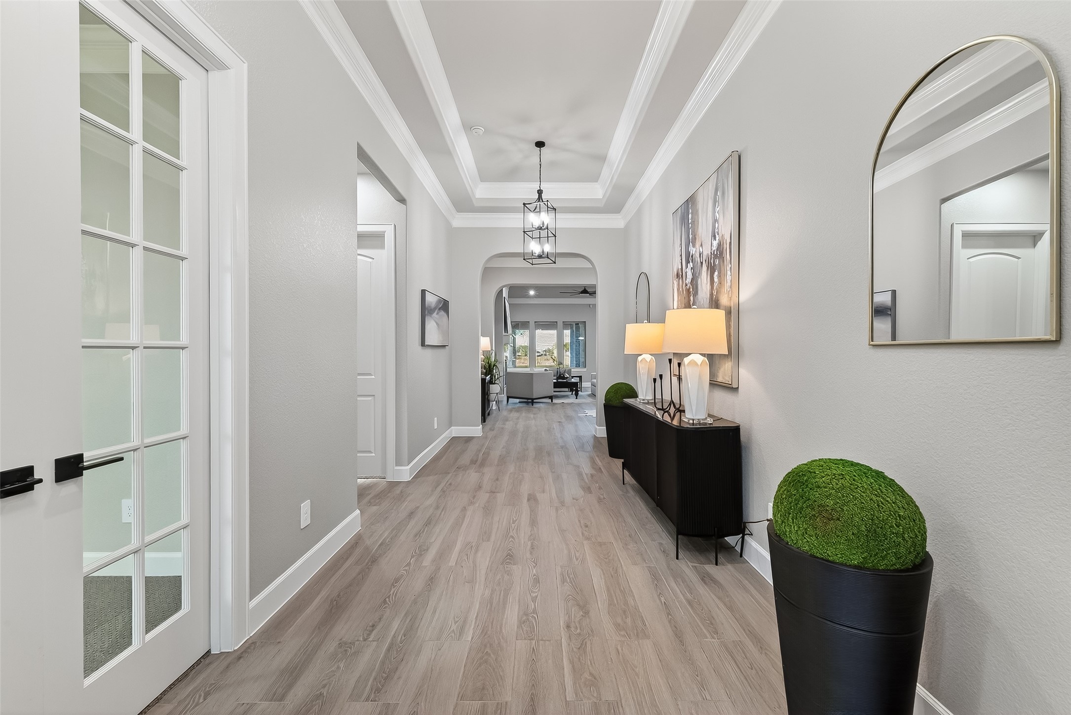 350 Lakeland Circle Rosharon, TX 77583 - Photo 8 of 49 a view of a hallway view with wooden floor and staircase