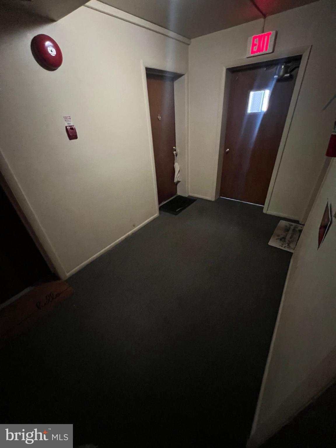 711 Ashland Avenue Secane, PA 19018 - Photo 2 of 8 Inviting hallway with warm lighting.