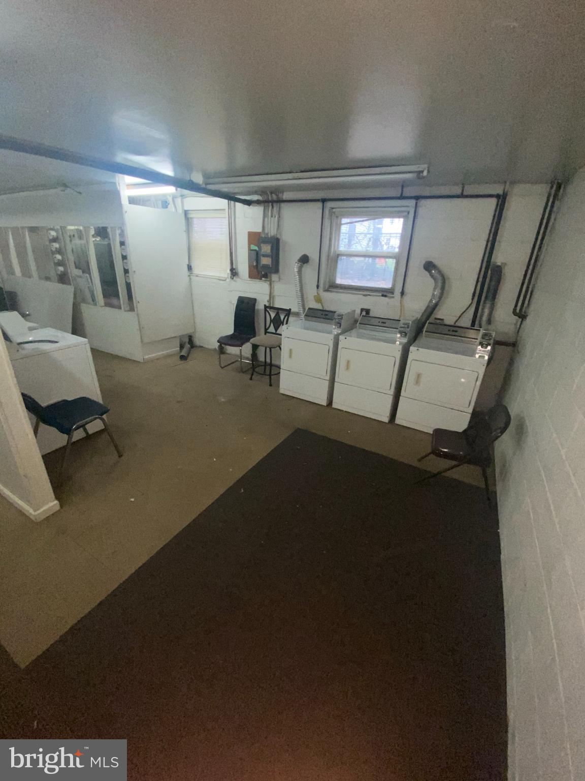 711 Ashland Avenue Secane, PA 19018 - Photo 4 of 8 Spacious laundry area with ample storage.