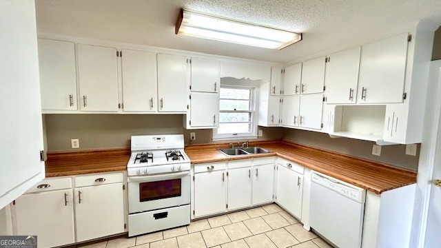 13 Eugenia Circle Rome, GA 30165 - Photo 11 of 19 a kitchen with granite countertop white cabinets and white appliances