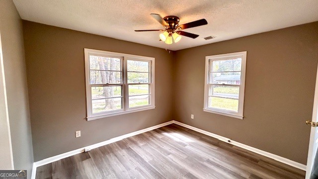 13 Eugenia Circle Rome, GA 30165 - Photo 14 of 19 a view of an empty room with a window and wooden floor