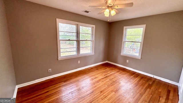 13 Eugenia Circle Rome, GA 30165 - Photo 15 of 19 a view of an empty room with wooden floor and a window