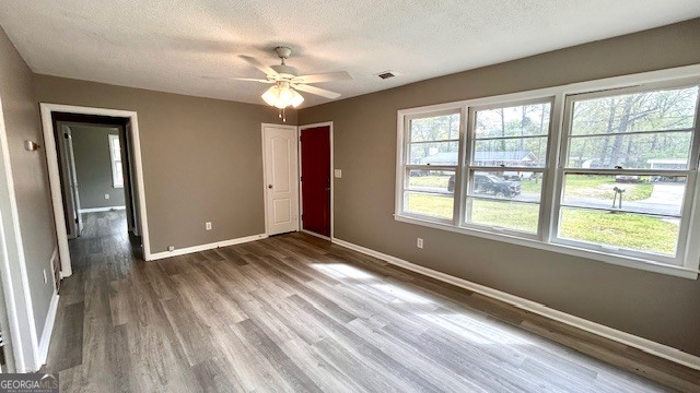 13 Eugenia Circle Rome, GA 30165 - Photo 7 of 19 a view of an empty room with a window and wooden floor