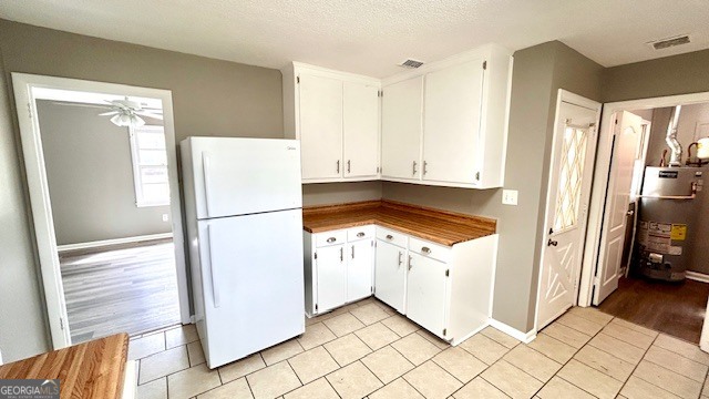 13 Eugenia Circle Rome, GA 30165 - Photo 10 of 19 a kitchen with a refrigerator a stove a washer and dryer