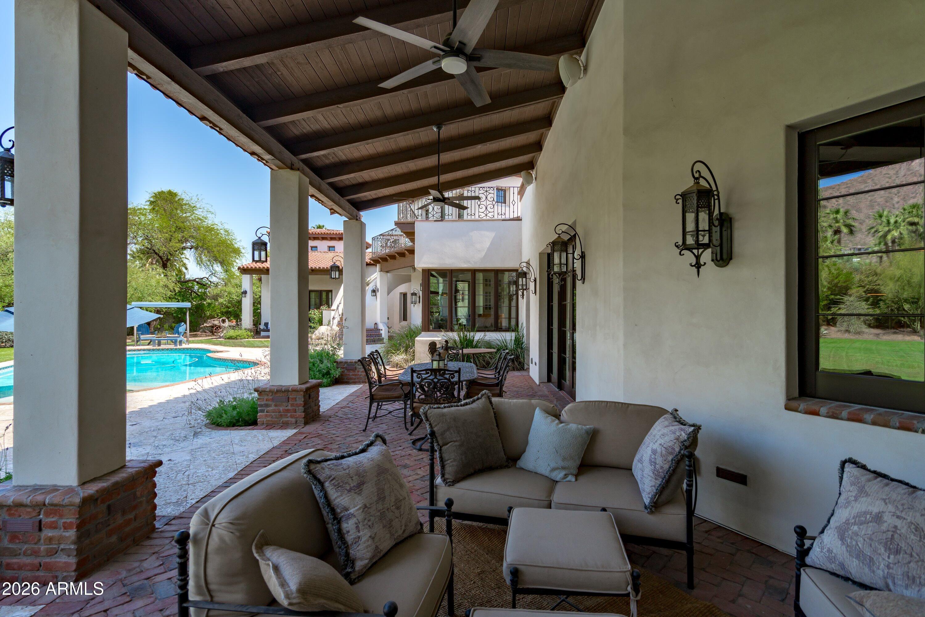 5434 East Camel Hill Road Phoenix, AZ 85018 - Photo 107 of 147 a outdoor living space with furniture potted plant and a large window