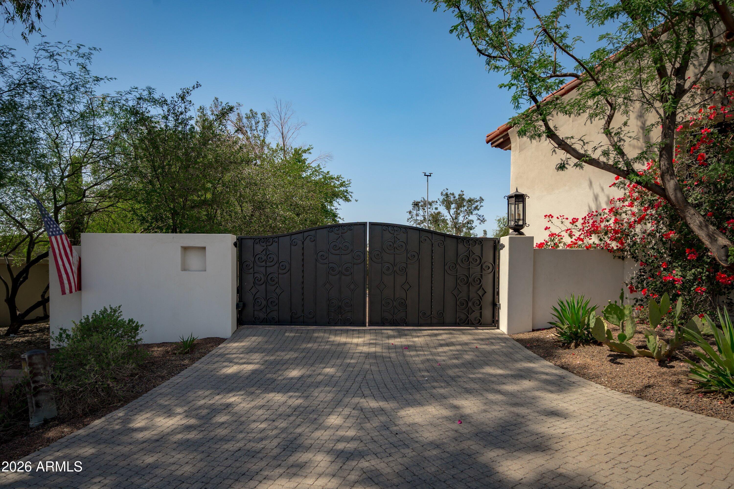 5434 East Camel Hill Road Phoenix, AZ 85018 - Photo 130 of 147 a front view of a house with a garage