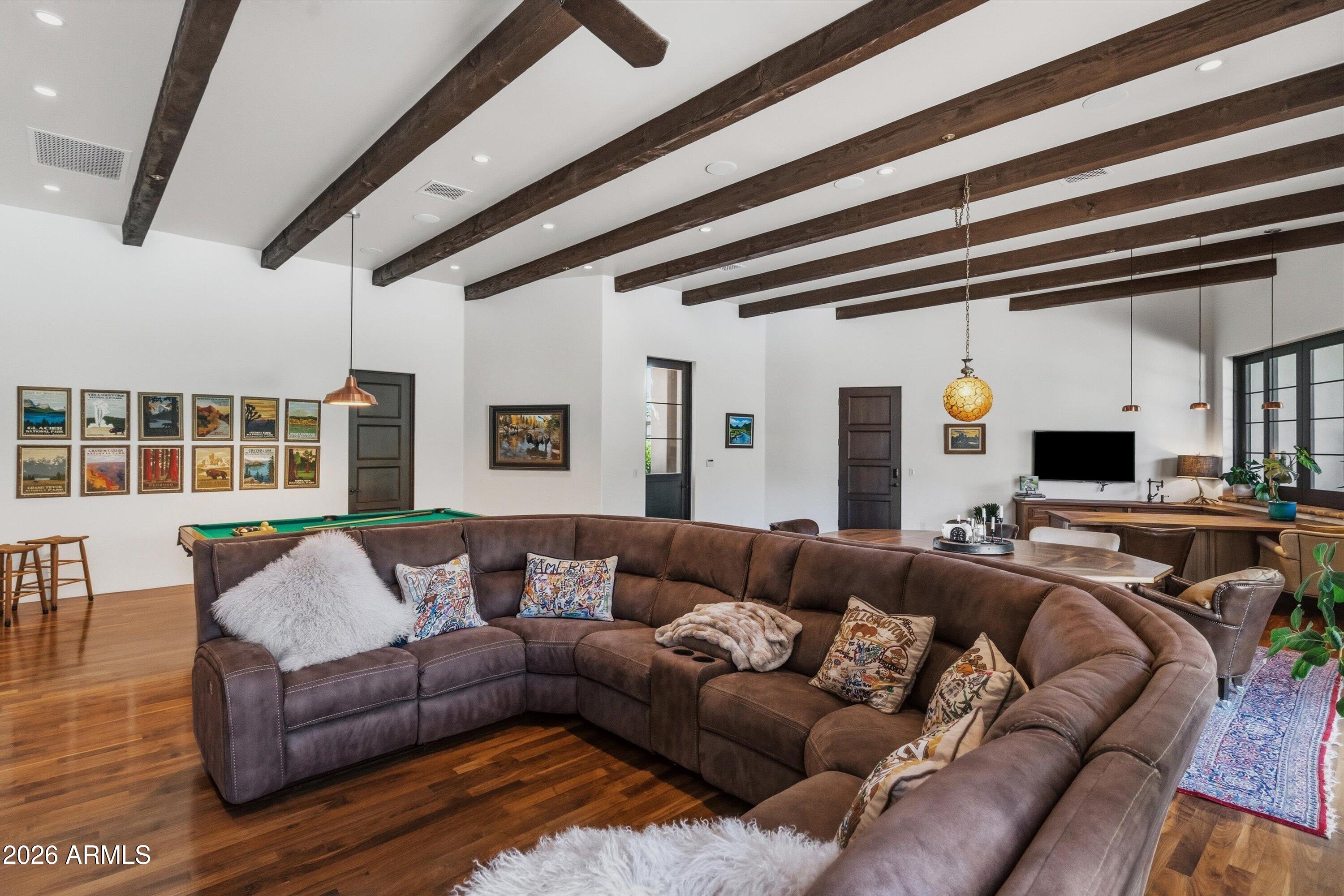 5434 East Camel Hill Road Phoenix, AZ 85018 - Photo 41 of 147 a living room with furniture and a large window