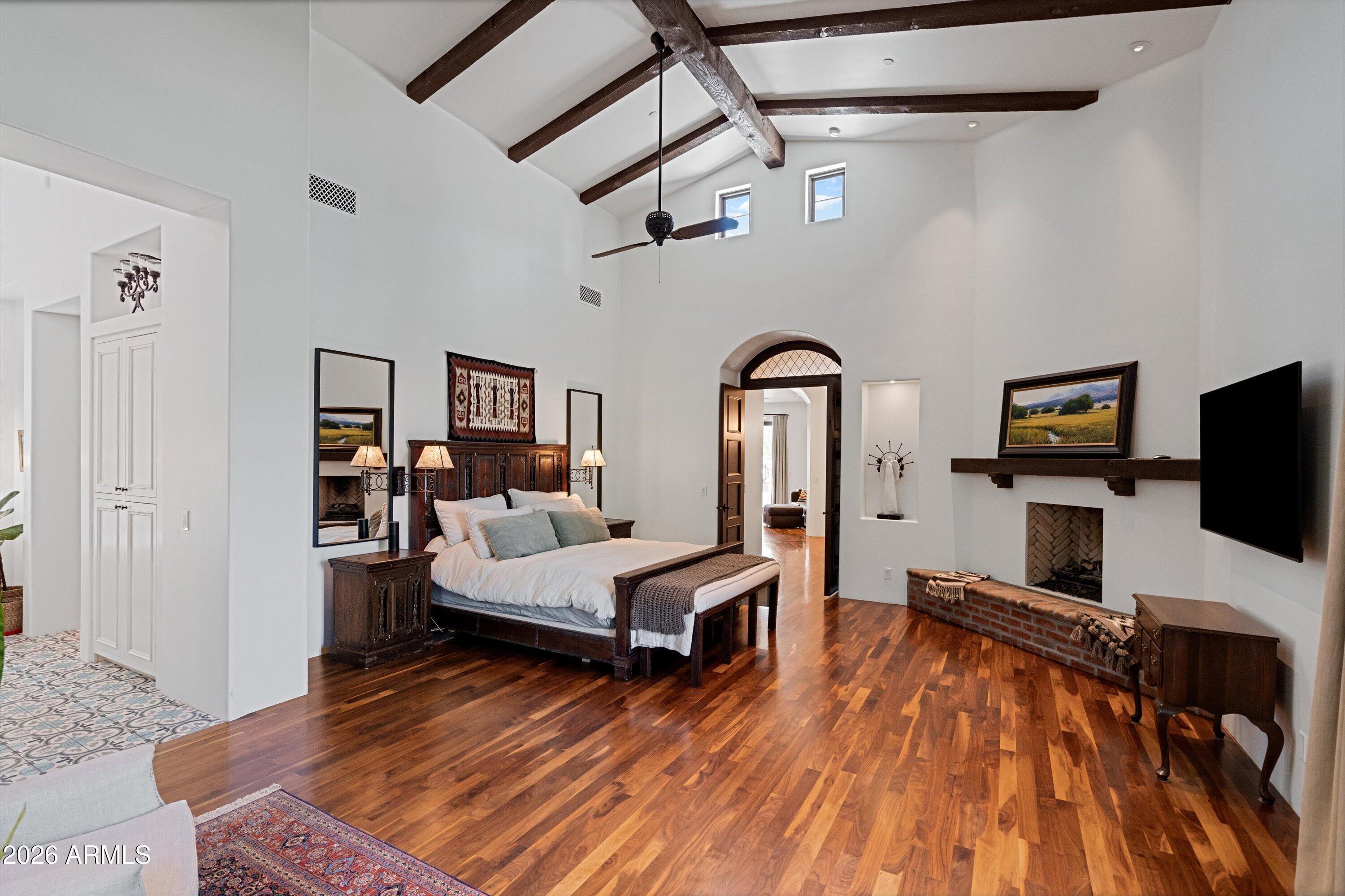 5434 East Camel Hill Road Phoenix, AZ 85018 - Photo 50 of 147 a living room with furniture and a flat screen tv