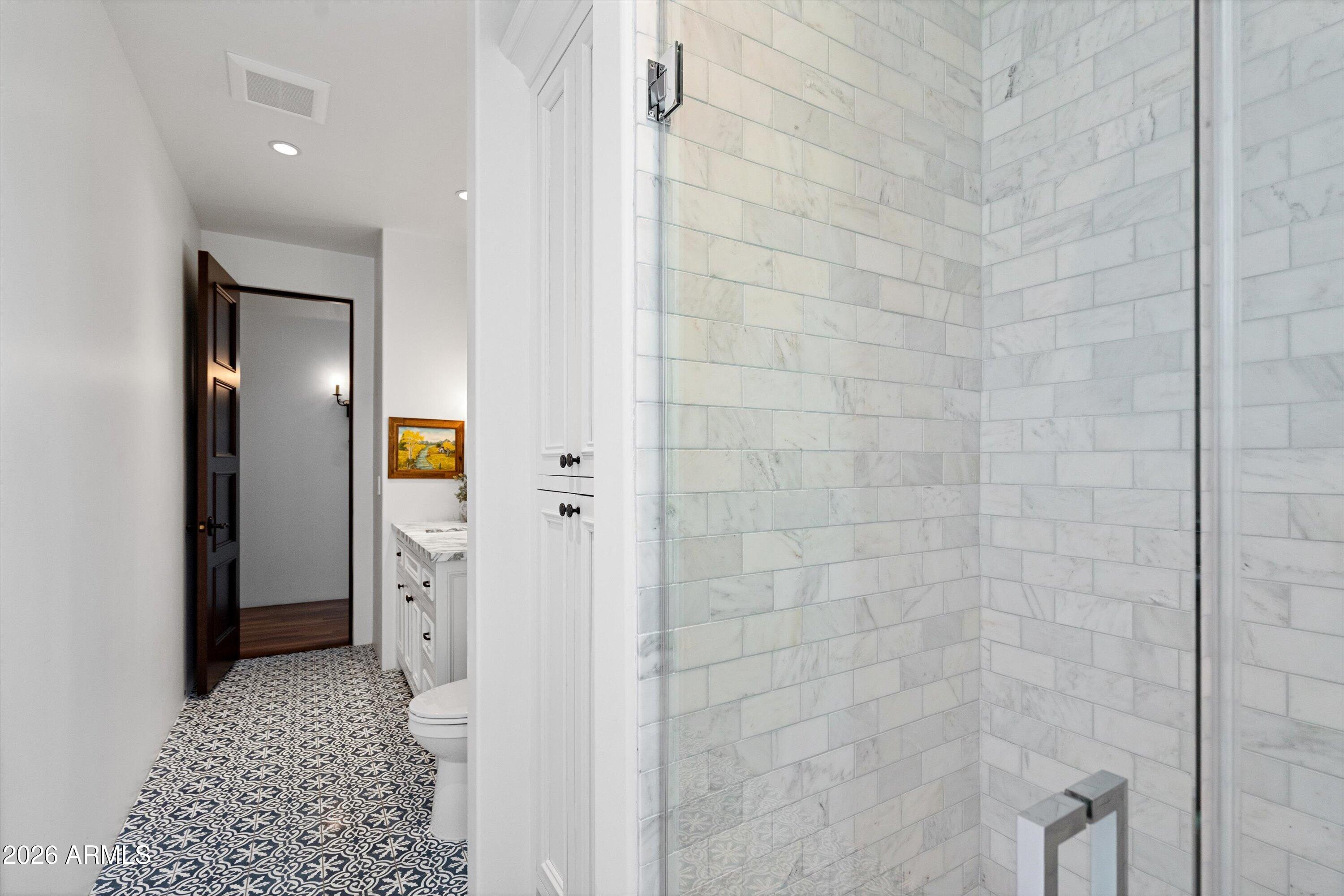 5434 East Camel Hill Road Phoenix, AZ 85018 - Photo 64 of 147 a bathroom with a shower and a sink