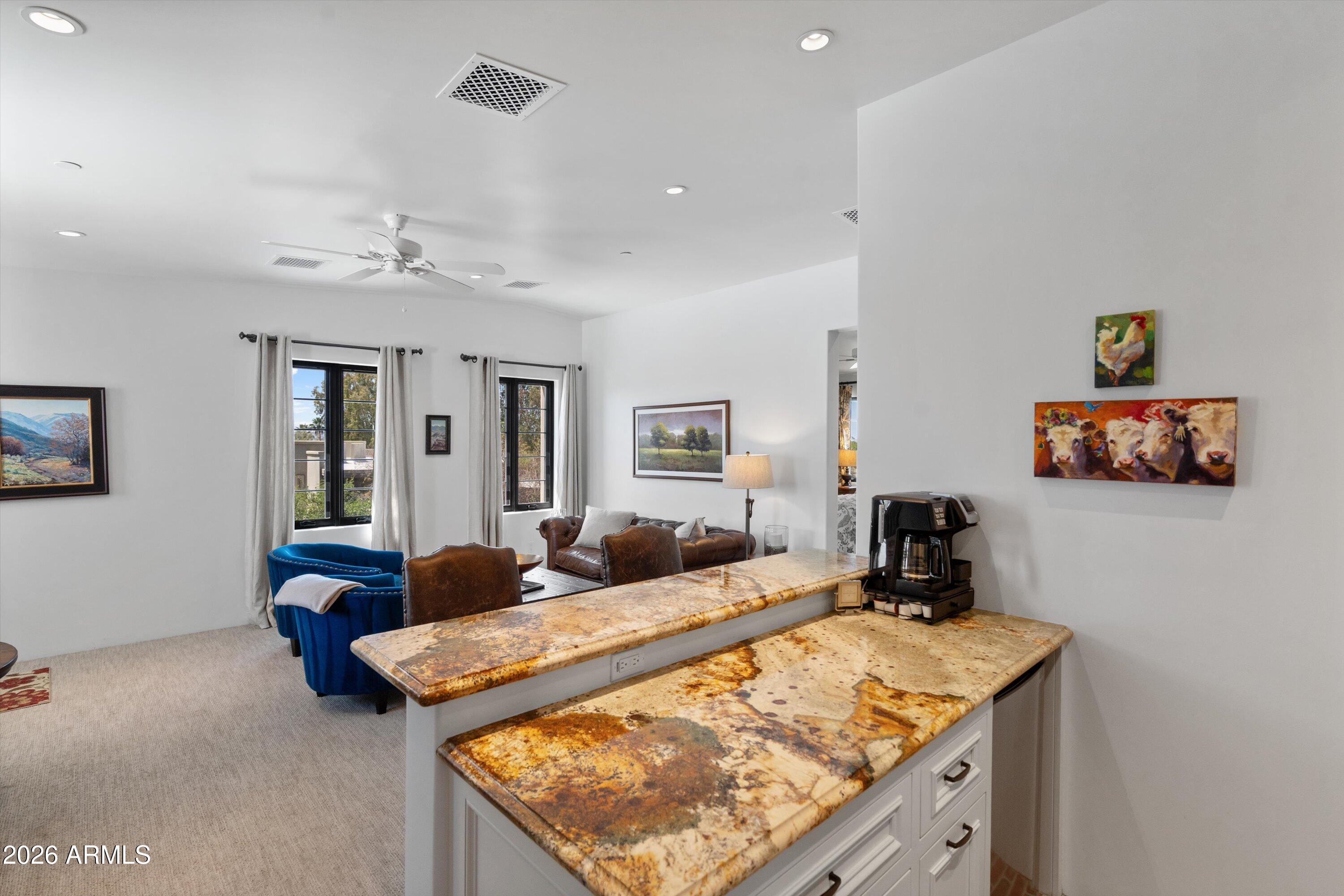 5434 East Camel Hill Road Phoenix, AZ 85018 - Photo 80 of 147 a bedroom with a bed and wooden floor