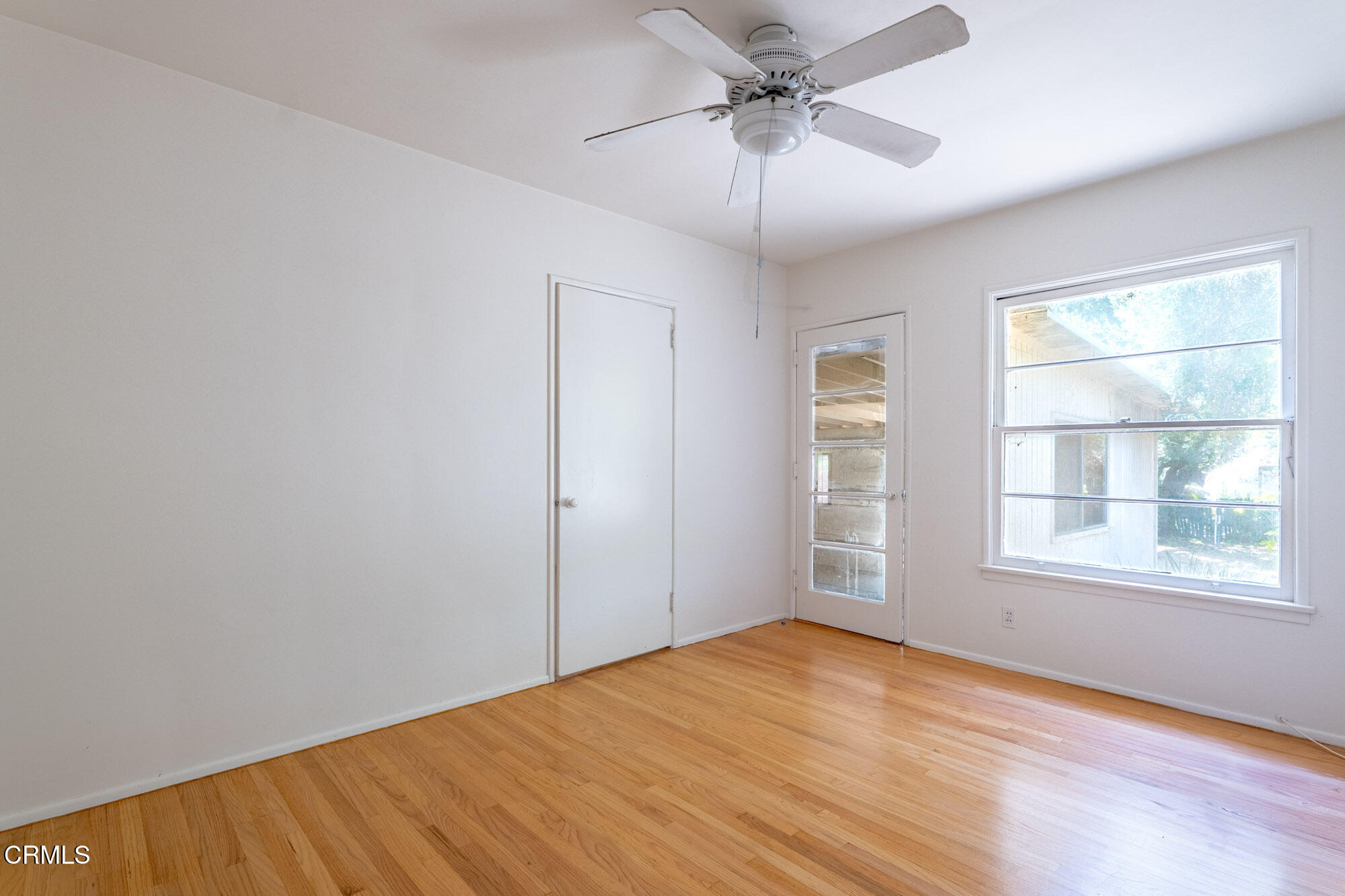 890 Arwin Street Pasadena, CA 91103 - Photo 14 of 40 wooden floor in an empty room with a window
